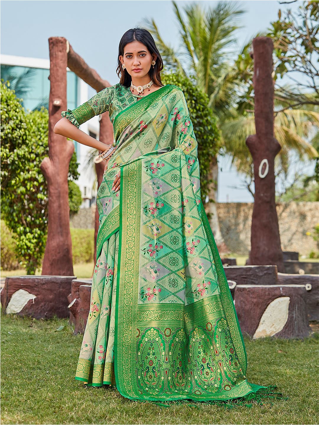 

Mitera Green & Pink Woven Design Zari Pure Silk Saree