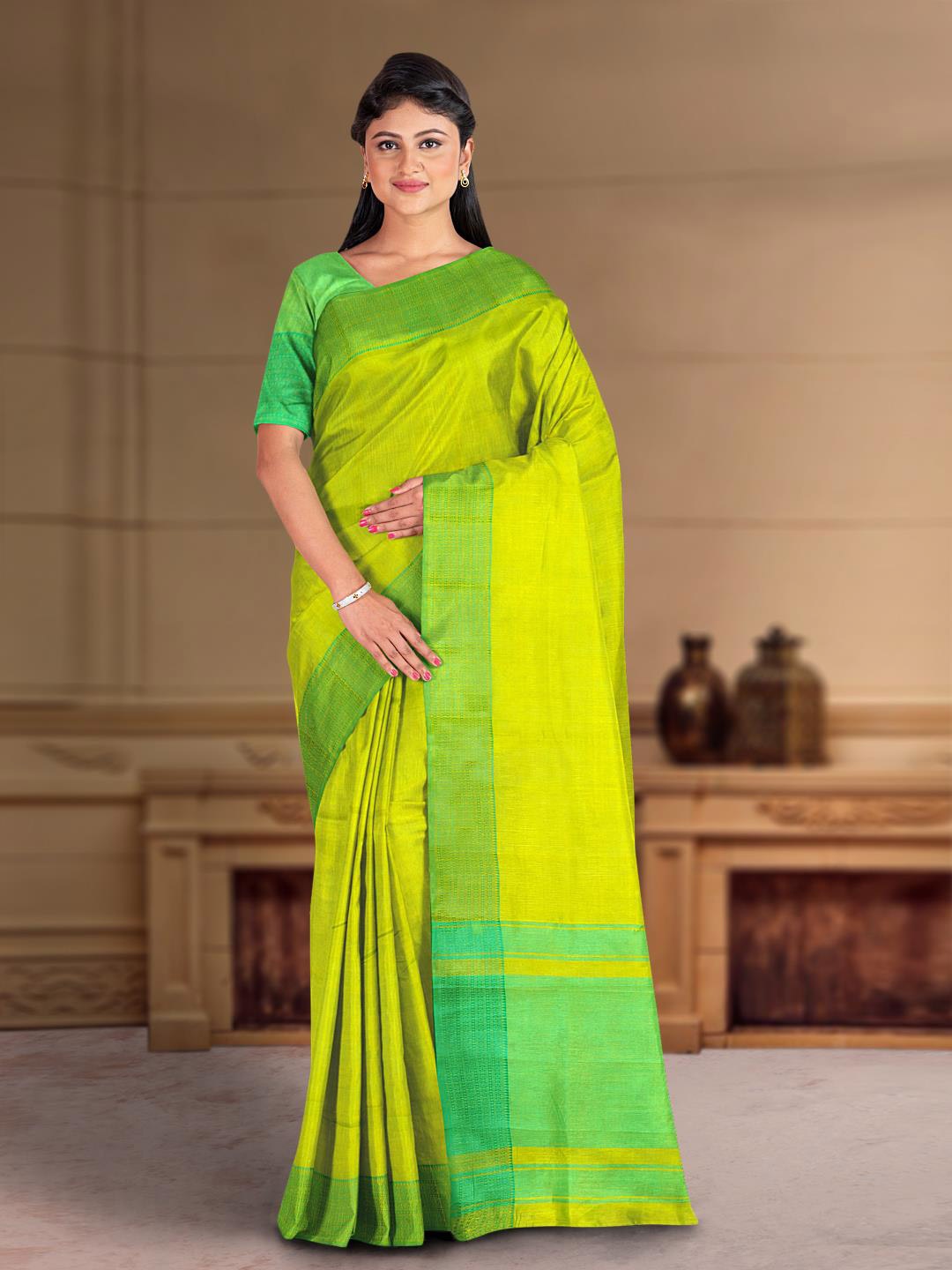 

Kalamandir Lime Green Tussar Silk Saree