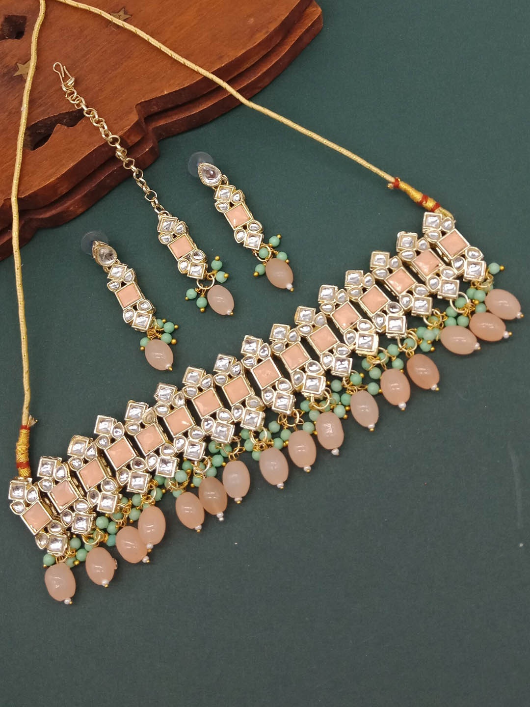 

AASHISH IMITATION Gold-Plated Stone-Studded & Pearl Beaded Jewellery Set