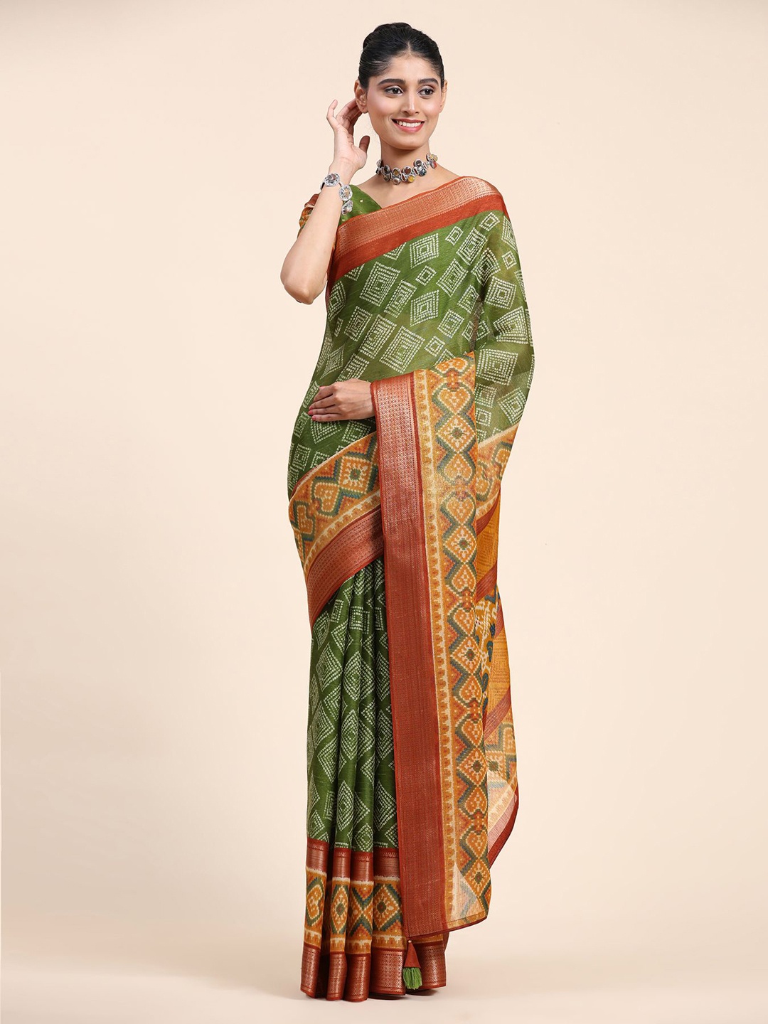 

Phenav Ethnic Motifs Printed Tasseled Zari Linen Blend Saree, Green