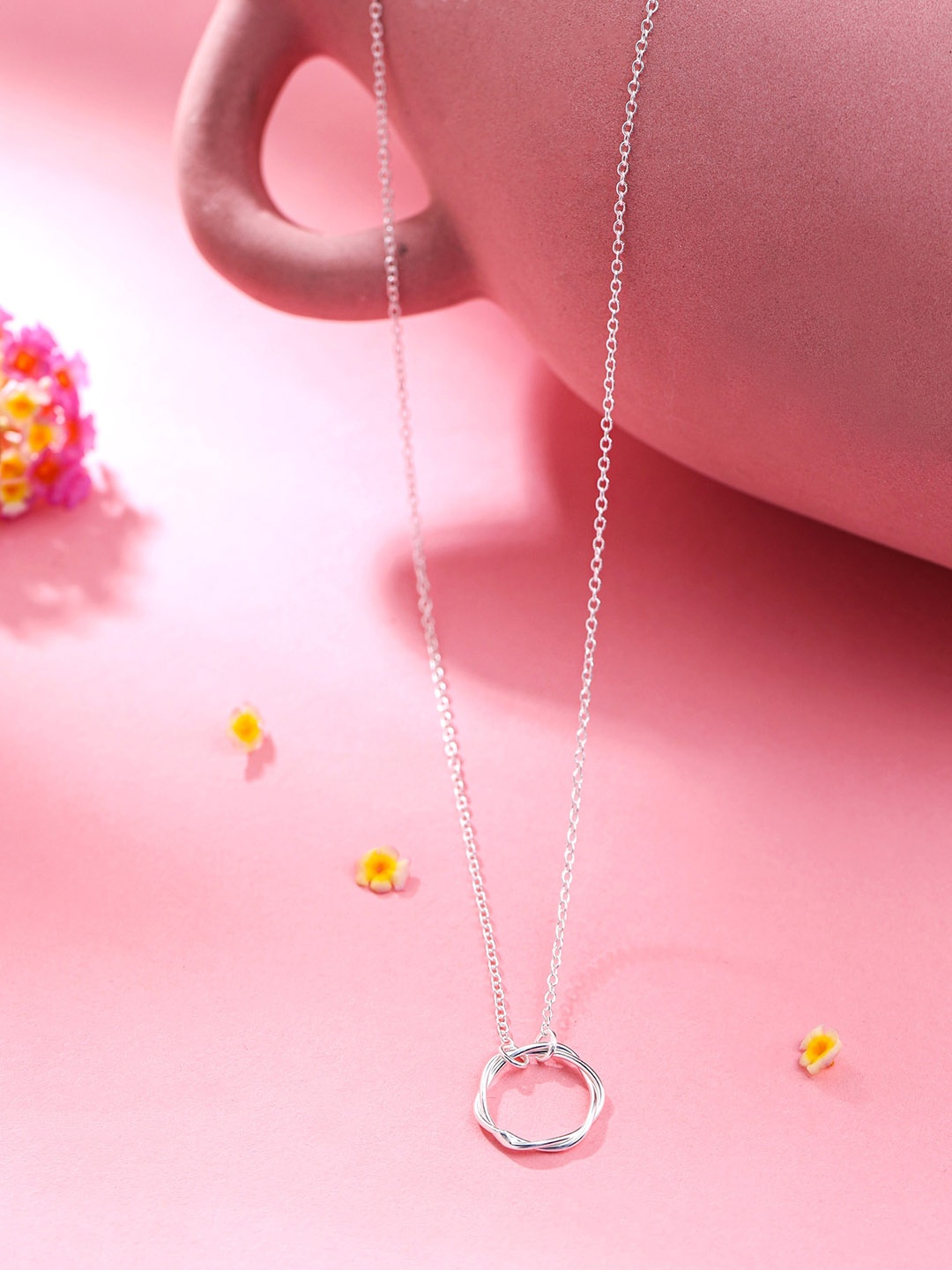 

Raajsi by Yellow Chimes Silver-Plated Circular Pendant