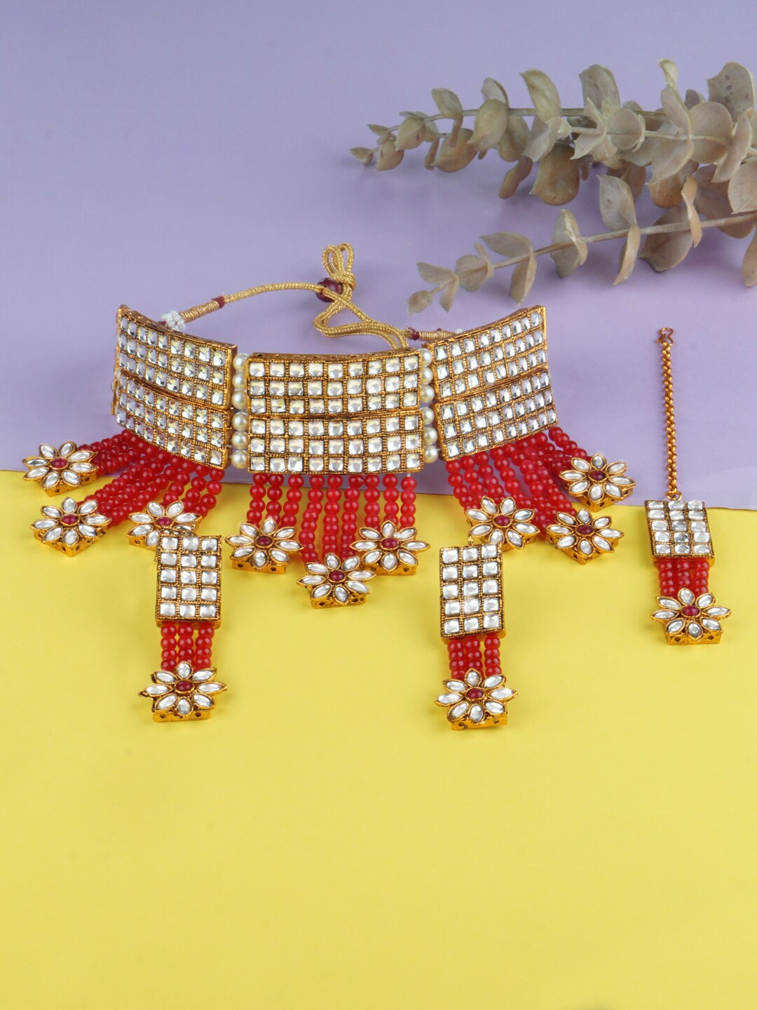 

Matushri Art Gold-Plated Stone Studded & Beaded Jewellery Set