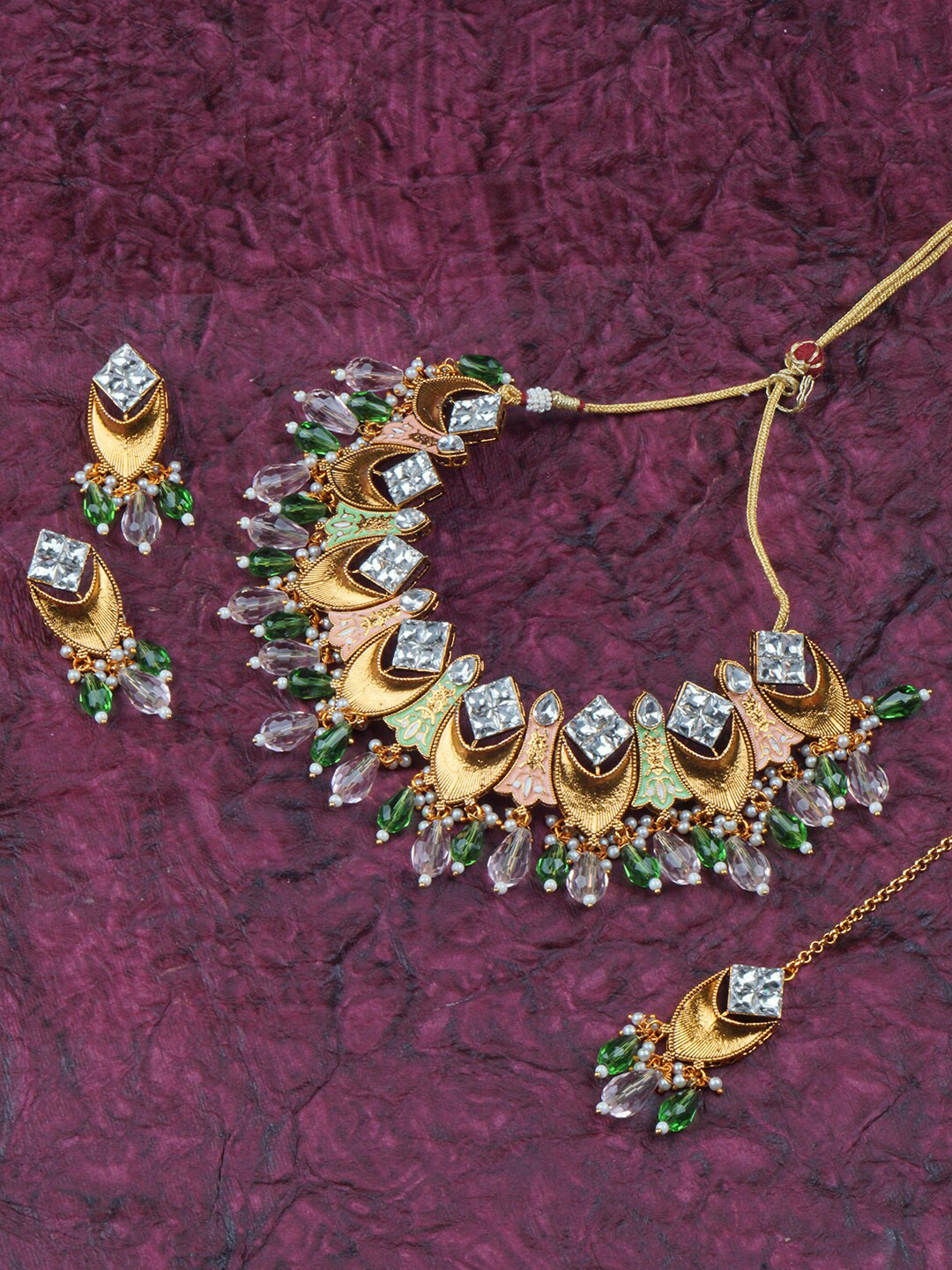 

Matushri Art Gold-Plated Stone-Studded & Beaded Jewellery Set