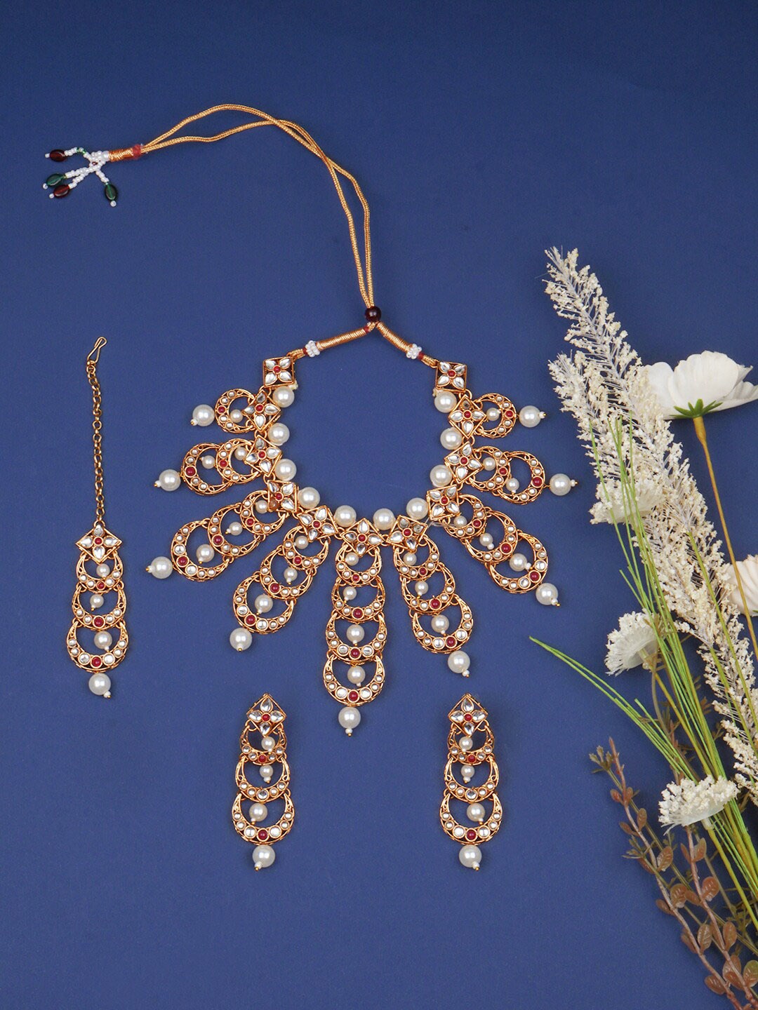 

Matushri Art Gold-Plated Stone-Studded & Beaded Jewellery Set