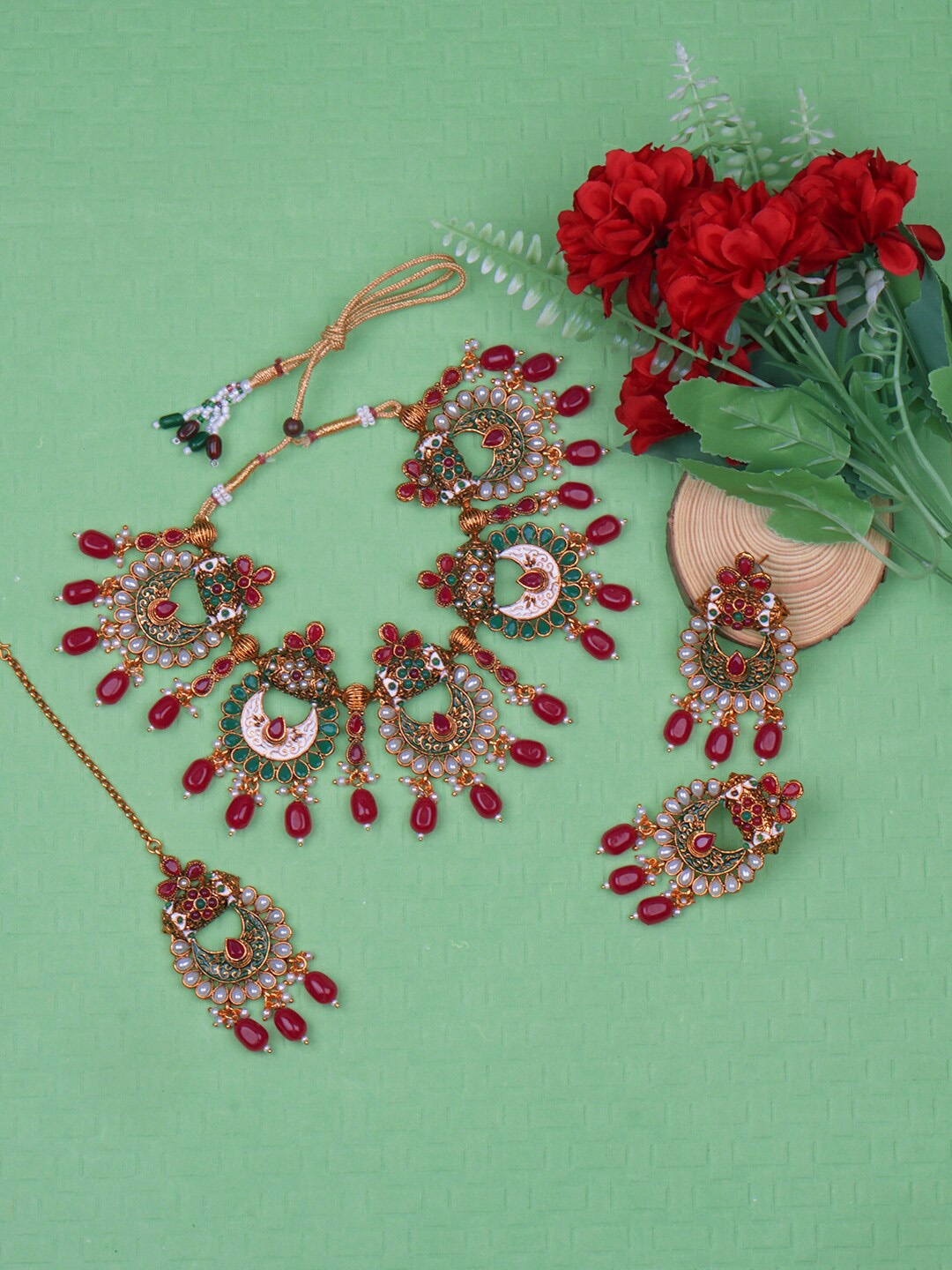 

Matushri Art Gold-Plated Stone Studded & Beaded Jewellery Set
