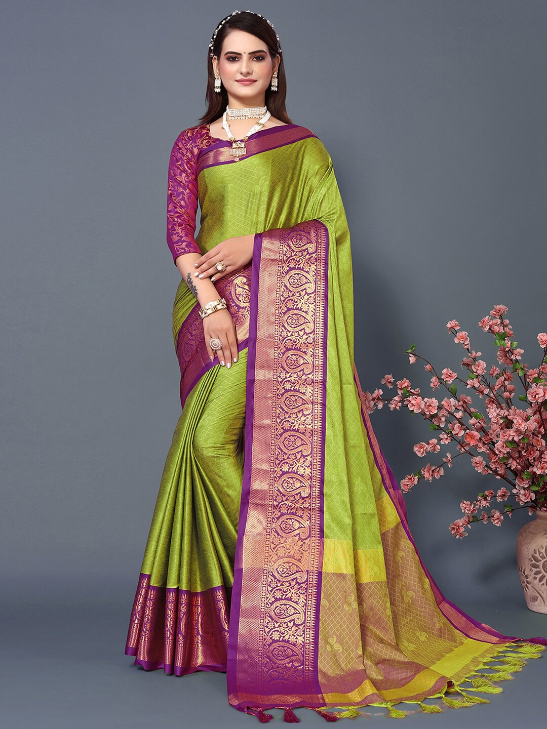 

Mitera Green & Purple Woven Design Zari Silk Cotton Saree