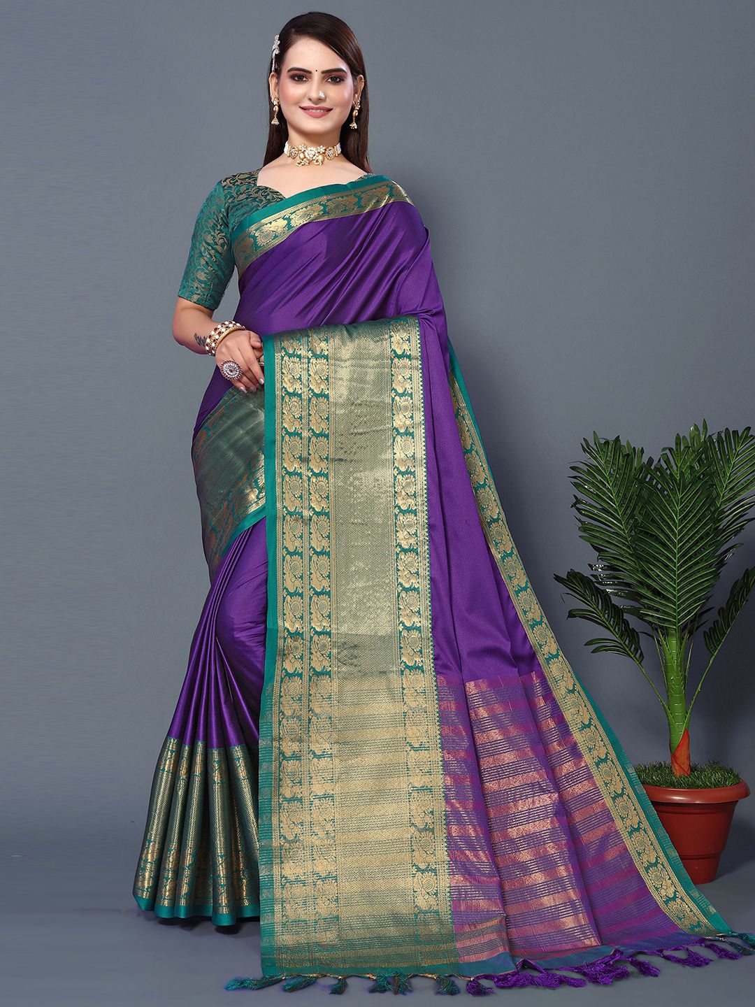 

Mitera Purple & Green Woven Design Zari Silk Cotton Saree