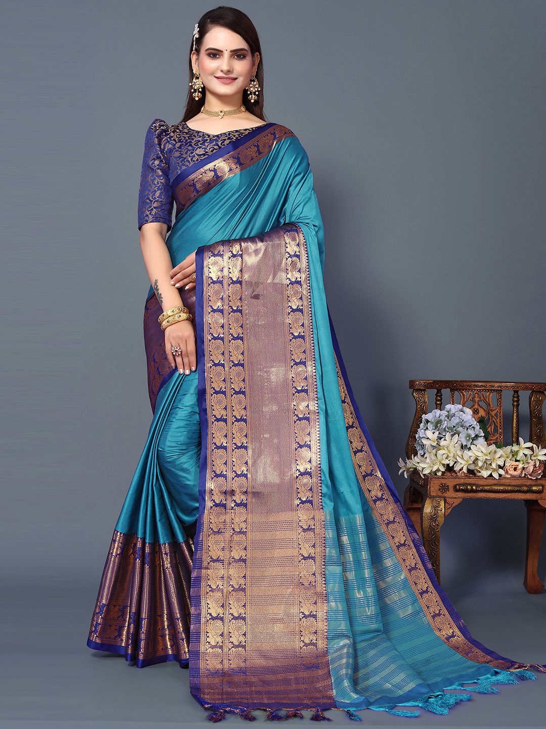 

Mitera Turquoise Blue & Gold-Toned Woven Design Zari Silk Cotton Saree