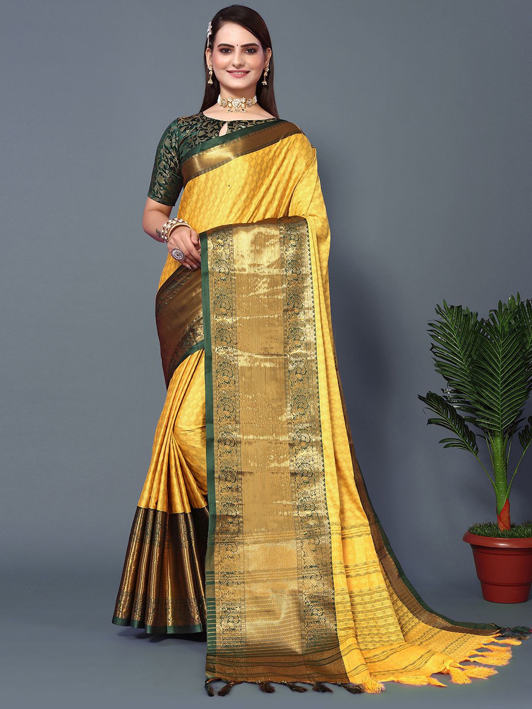 

Mitera Yellow & Green Woven Design Zari Silk Cotton Saree