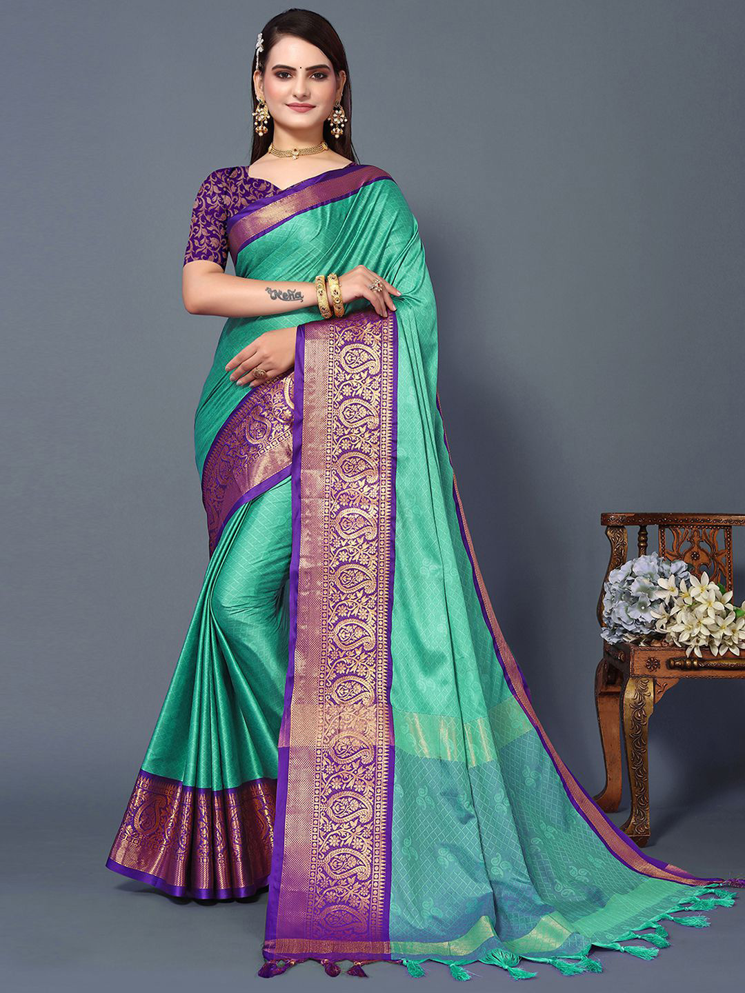 

Mitera Green & Purple Woven Design Zari Silk Cotton Saree
