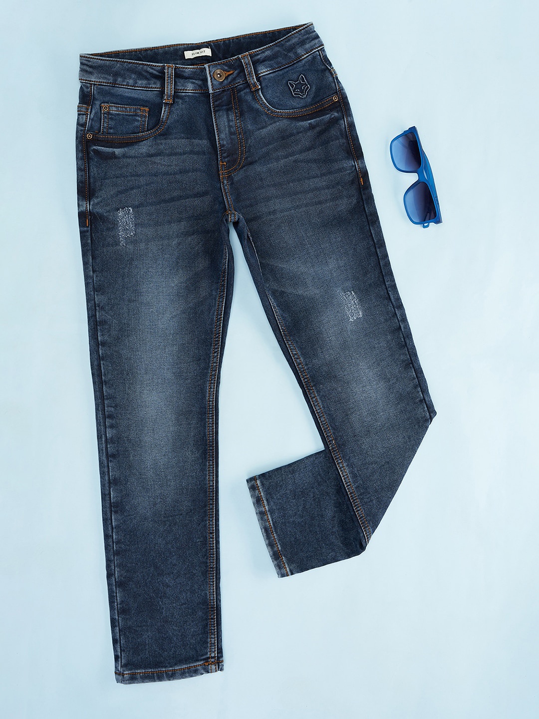 

Pantaloons Junior Boys Mildly Distressed Heavy Fade Stretchable Jeans, Blue