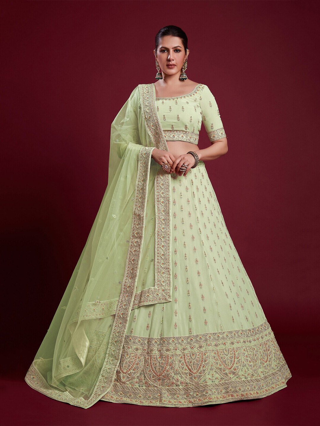 

Readiprint Fashions Embroidered Thread Work Semi-Stitched Lehenga & Unstitched Blouse, Green
