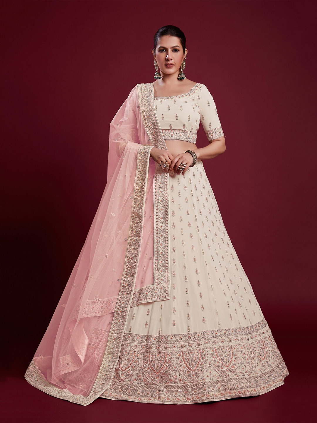

Readiprint Fashions Embroidered Thread Work Semi-Stitched Lehenga & Unstitched, Off white