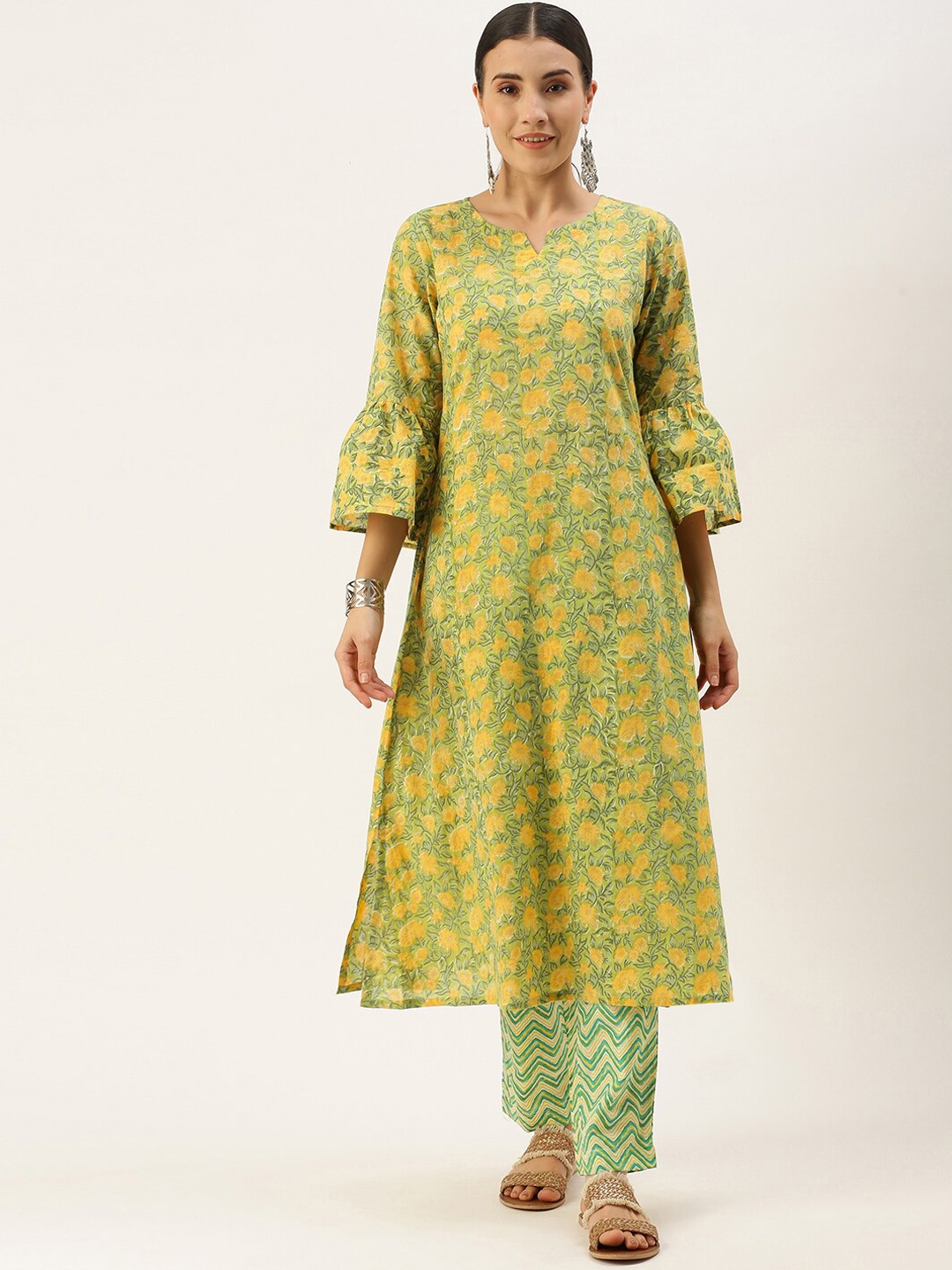 

Saanjh Green Floral Printed Bell Sleeves Pure Cotton Kurta With Trousers