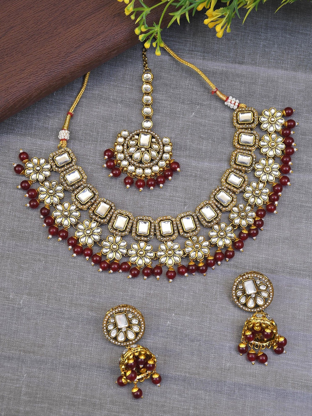 

Crunchy Fashion Gold-Plated Kundan Studded Jewellery Set