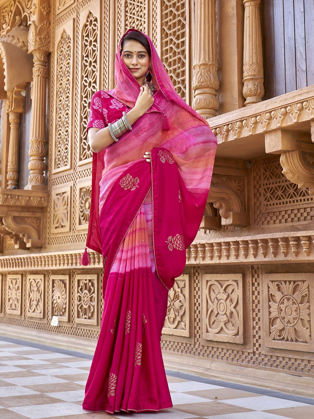 

Triveni Pink & Gold-Toned Striped Pure Georgette Saree
