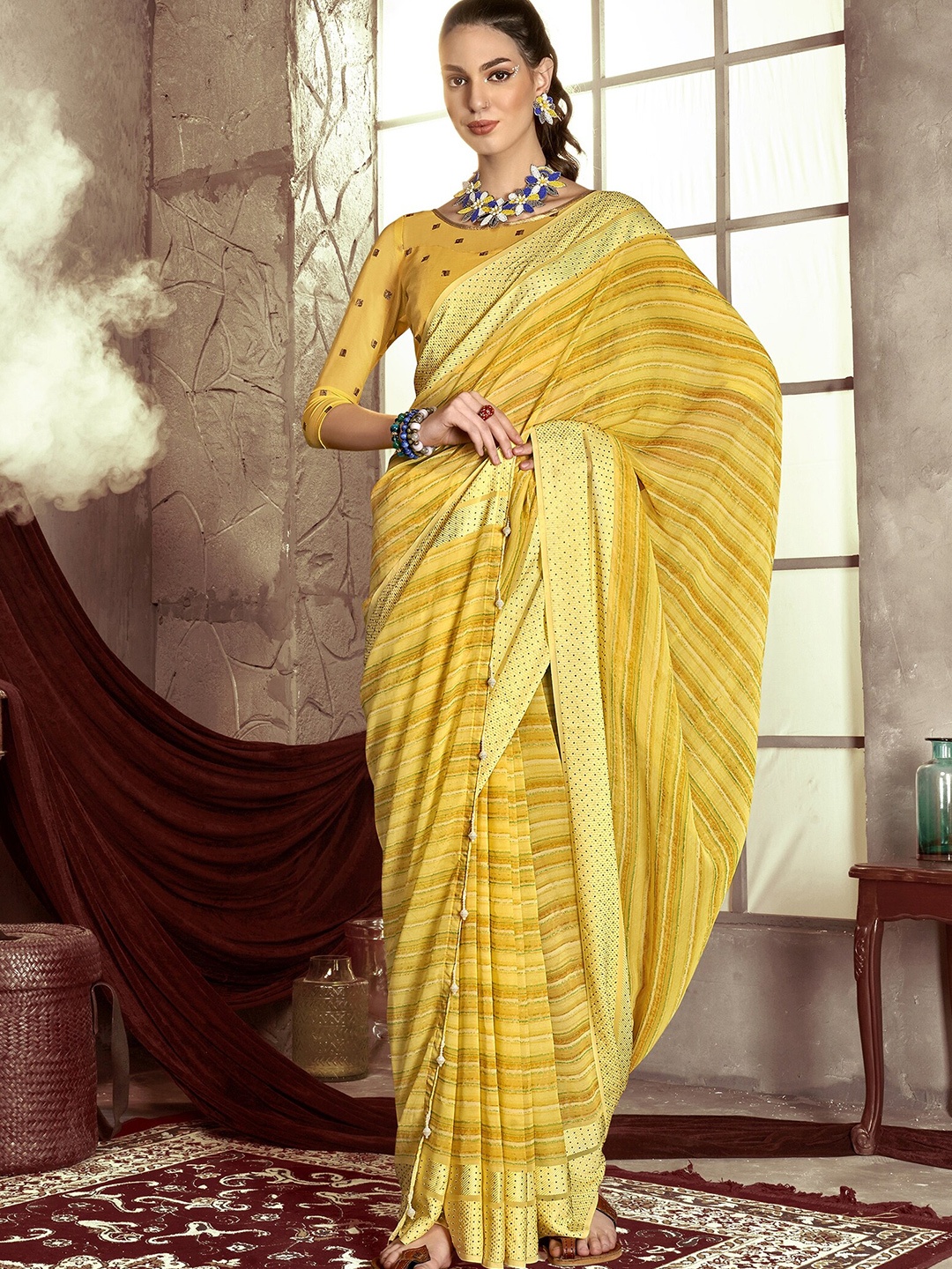 

Triveni Striped Beads and Stones Pure Georgette Saree, Yellow