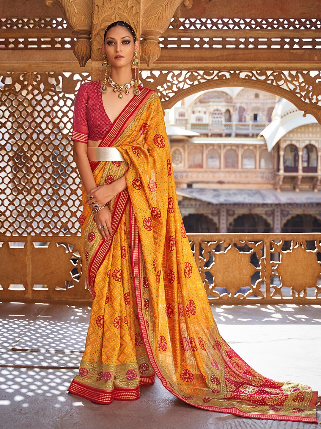 

Anouk Yellow & Red Ethnic Motifs Pure Georgette Bandhani Saree
