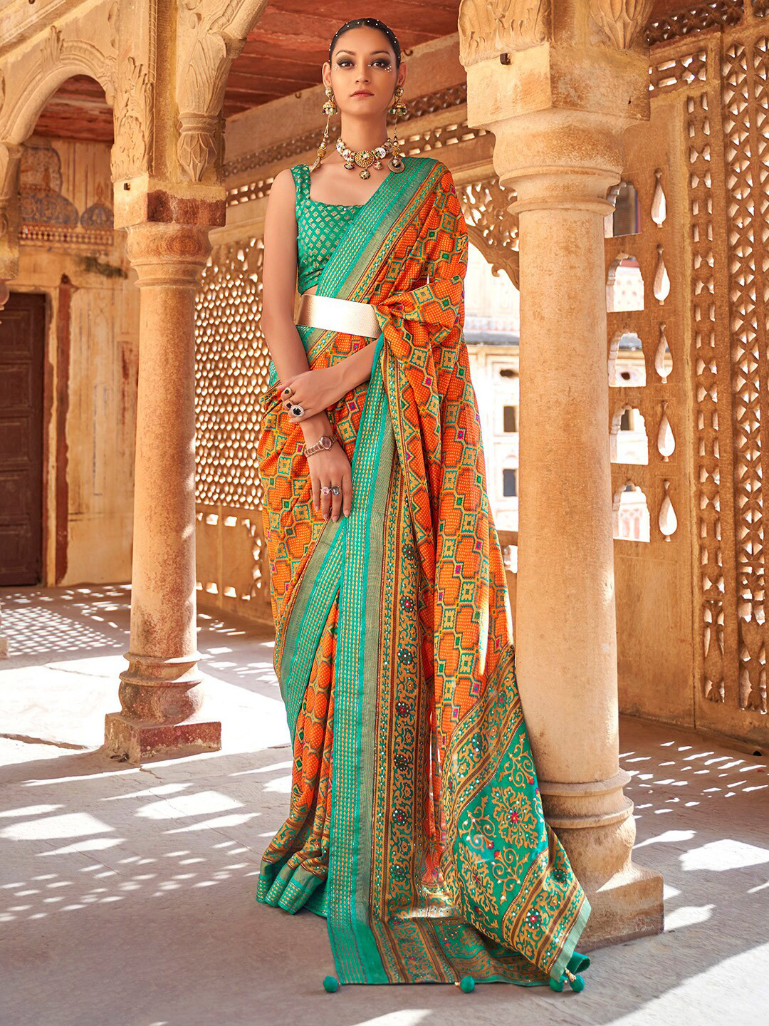 

Anouk Orange & Green Ethnic Motifs Printed Zari Pure Georgette Bandhani Saree