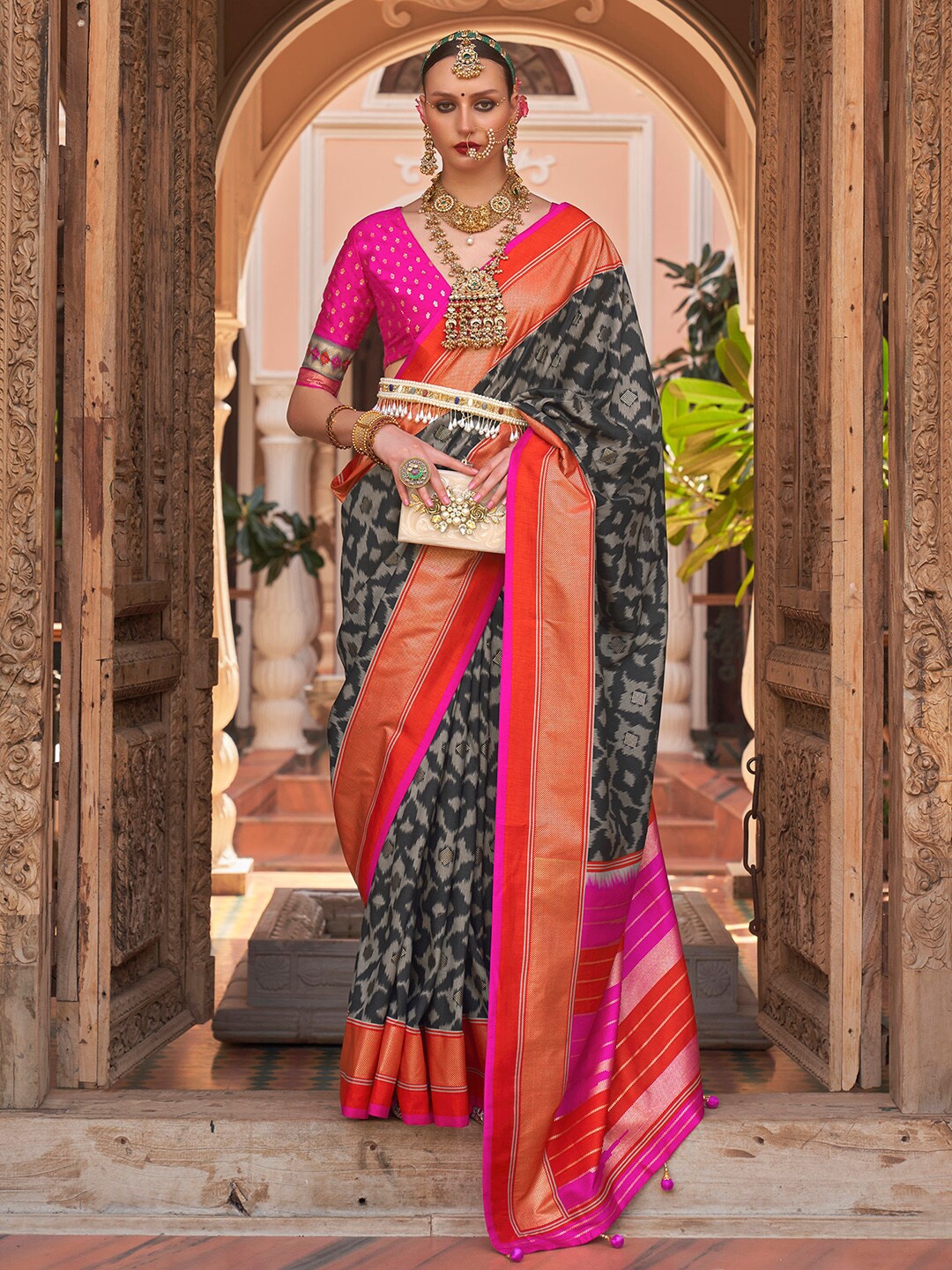

Anouk Black & Red Woven Design Zari Silk Blend Banarasi Saree