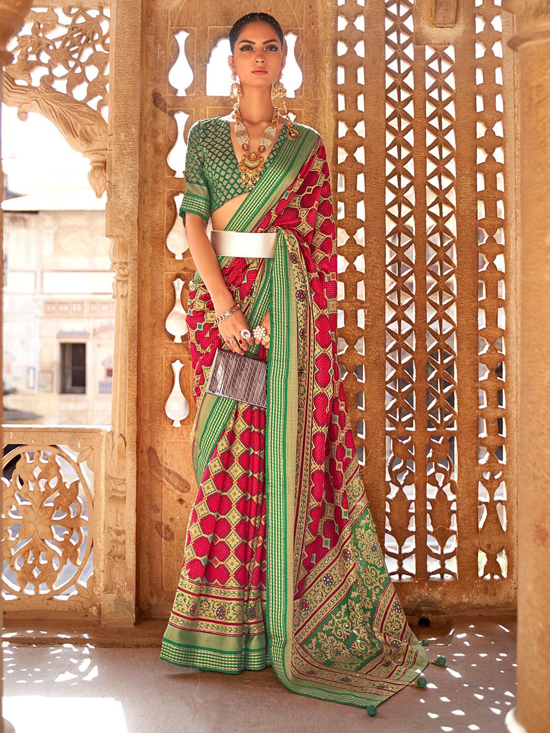 

Anouk Pink & Green Ethnic Motifs Printed Zari Pure Georgette Bandhani Saree