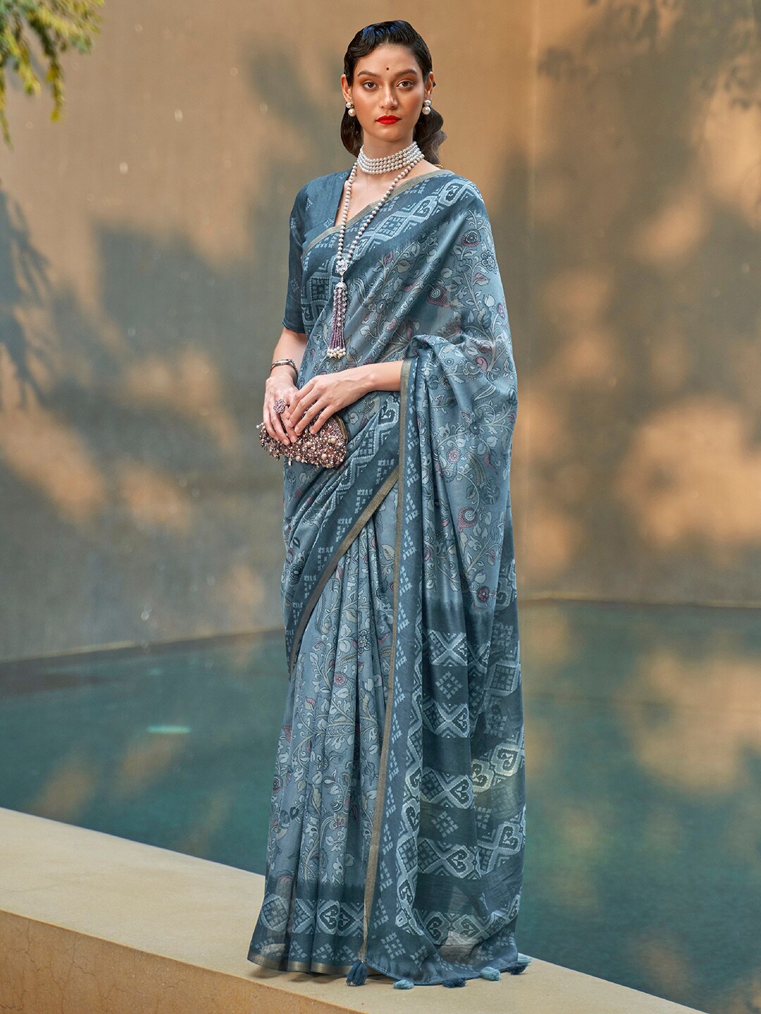 

Anouk Teal & Gold-Toned Ethnic Motifs Zari Bagh Saree