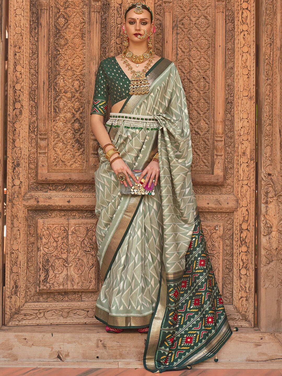 

Anouk Green & Maroon Geometric Woven Design Zari Banarasi Saree