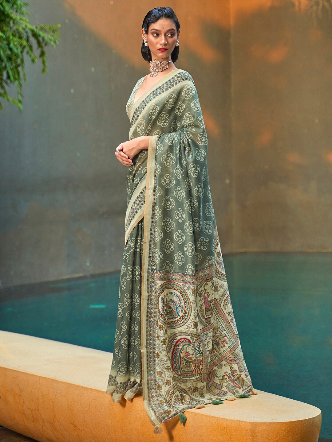 

Anouk Sea Green & Red Ethnic Motifs Printed Zari Bagh Saree