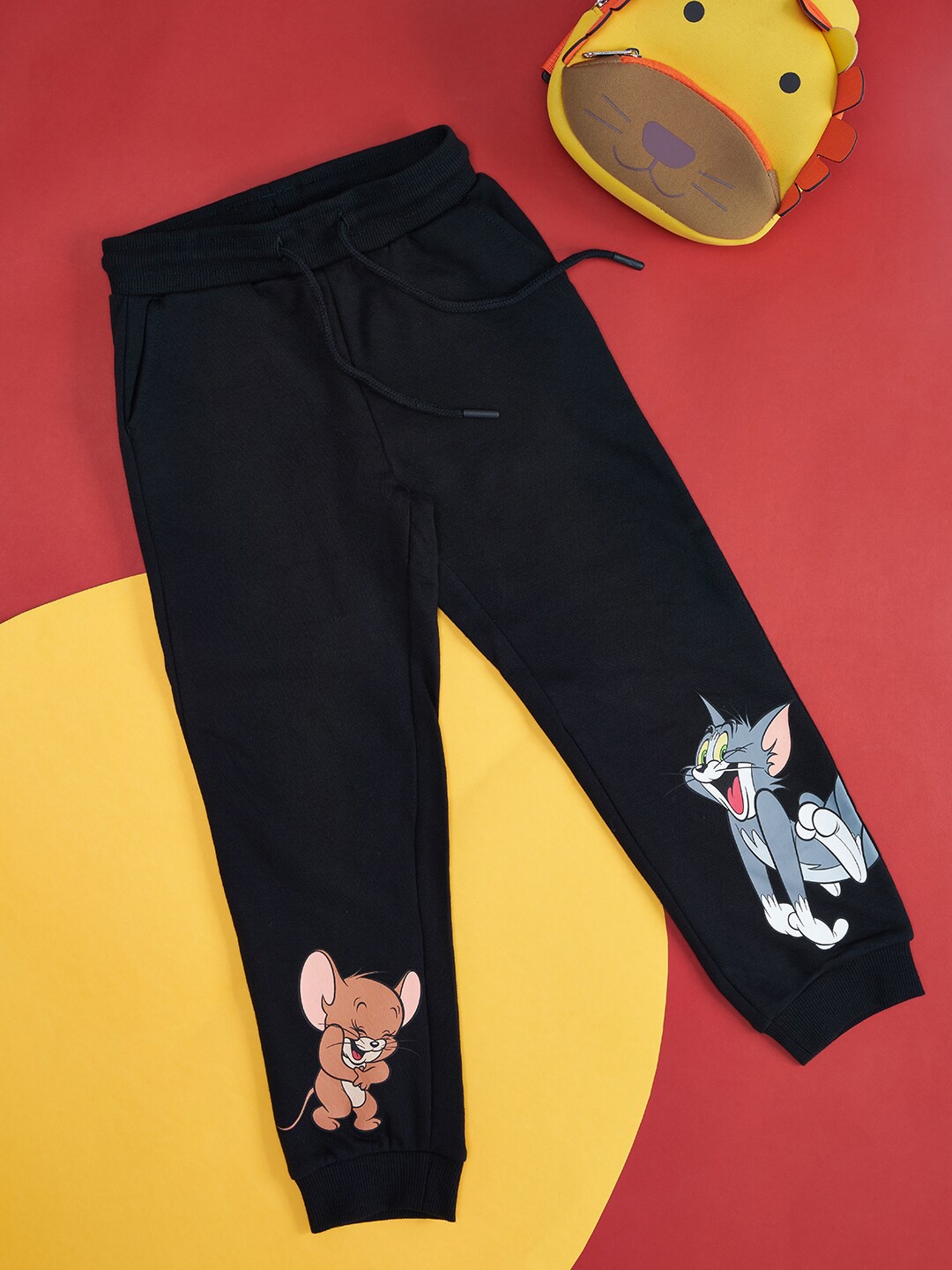 

Pantaloons Junior Girls Tom & Jerry Printed Mid-Rise Cotton Joggers, Black