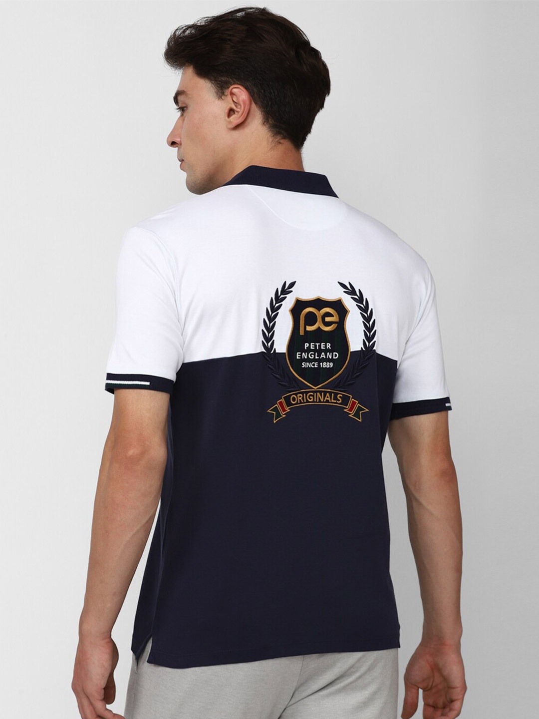 

Peter England Elite Monochrome Colourblocked Pure Cotton Polo Collar T-shirt, Navy blue