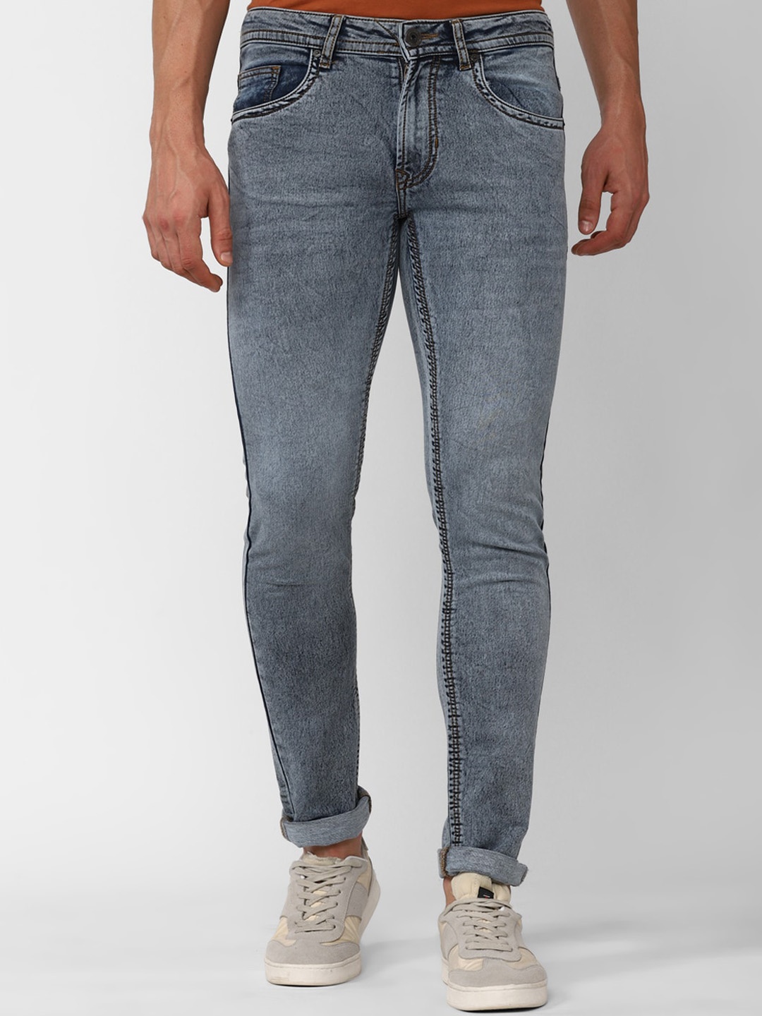 

Peter England Casuals Men Mid-Rise Skinny Fit Heavy Fade Jeans, Blue