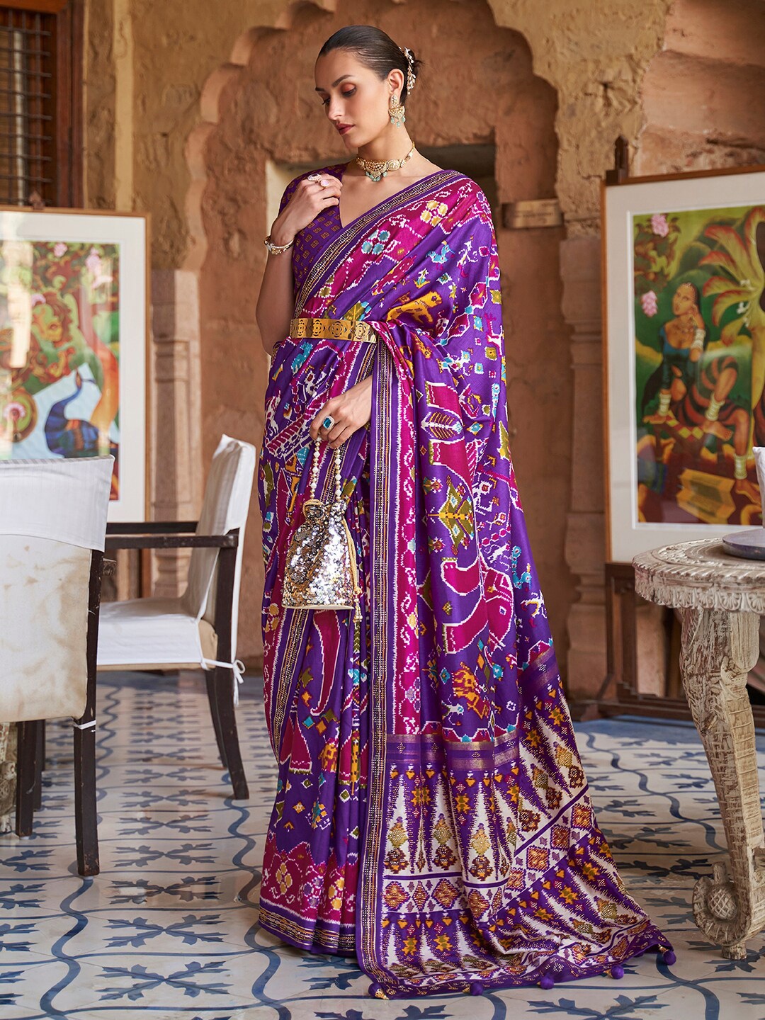 

Anouk Purple & Pink Ethnic Motifs Beads and Stones Silk Blend Patola Saree