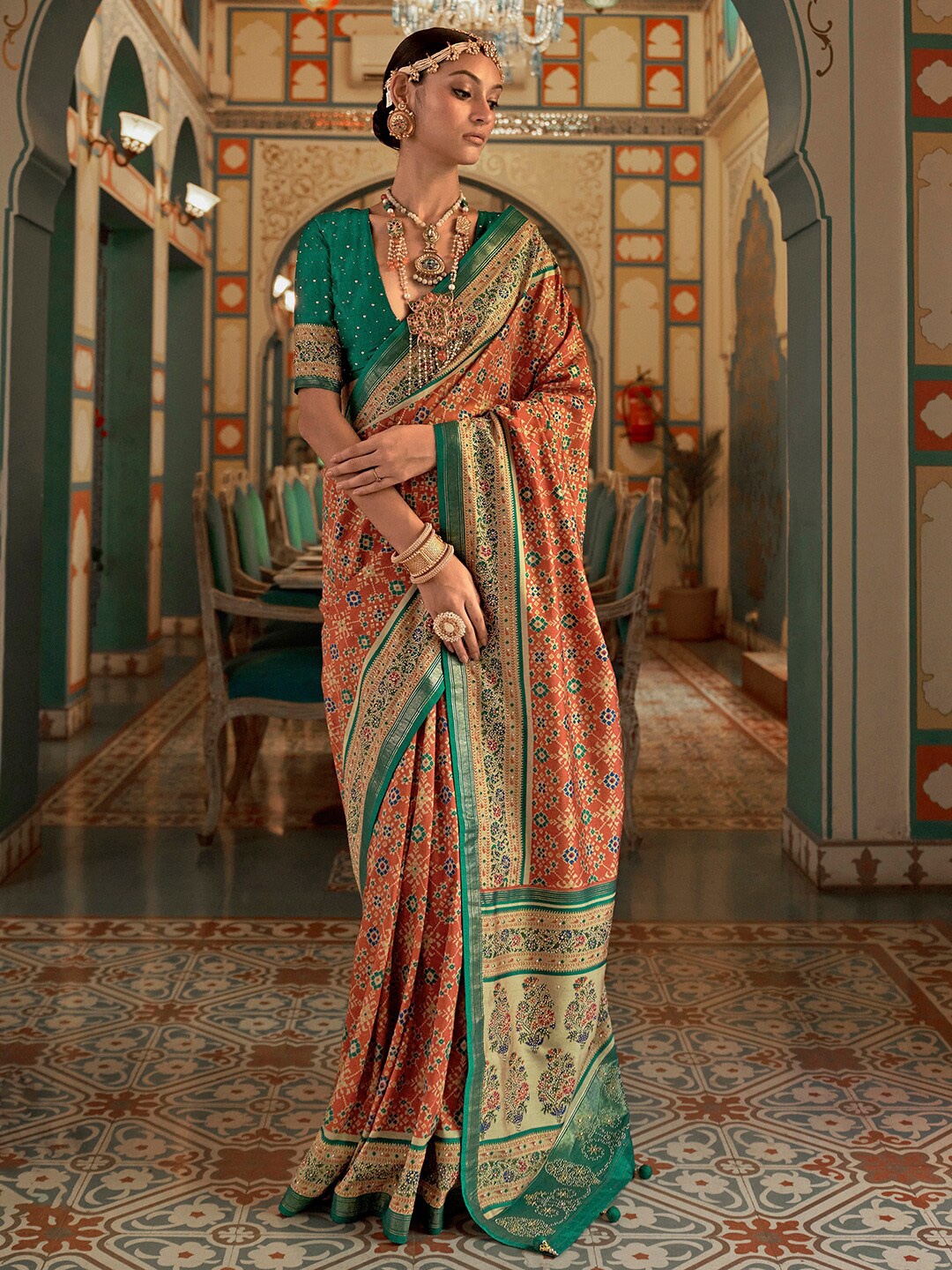 

Anouk Rust & Green Ethnic Motifs Printed Zari Banarasi Saree