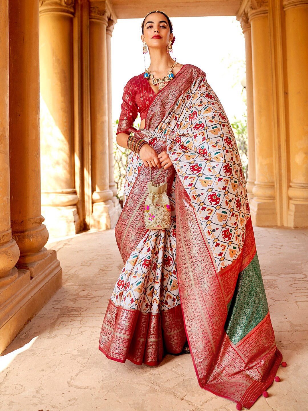 

Anouk Cream-Coloured & Green Ethnic Printed Zari Patola Saree