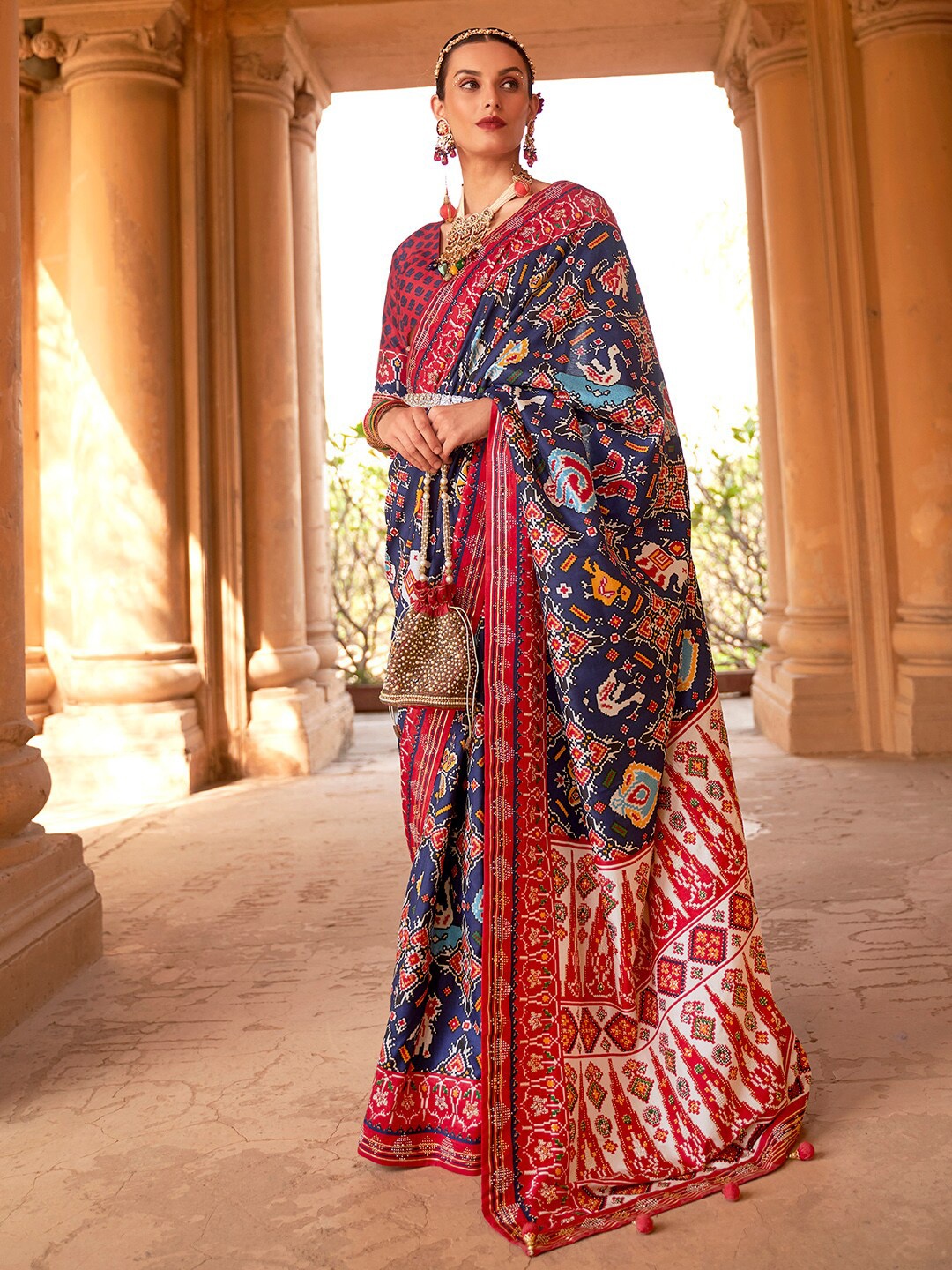 

Anouk Navy Blue & Red Ethnic Motifs Printed Beads and Stones Patola Saree