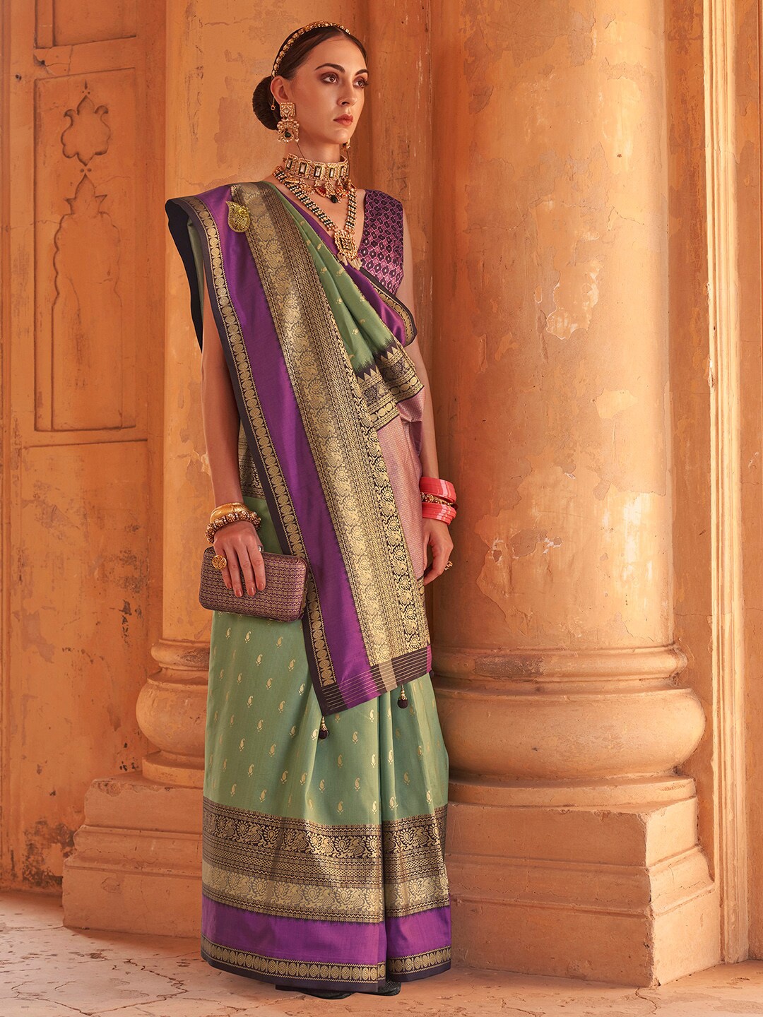 

Anouk Sea Green & Purple Ethnic Motifs Zari Silk Blend Banarasi Saree