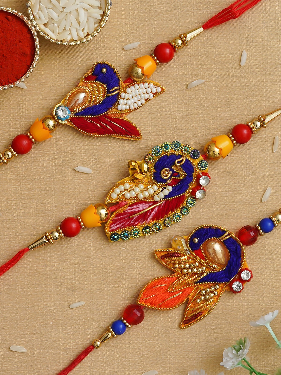 

Fashion Bizz Set of 3 Red & Blue Peacock Rakhi, Multi