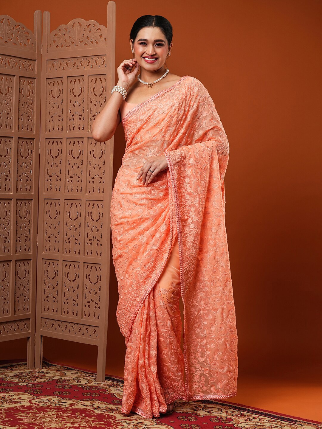 

Anouk Peach-Color Ethnic Motifs Embroidered Organza Saree