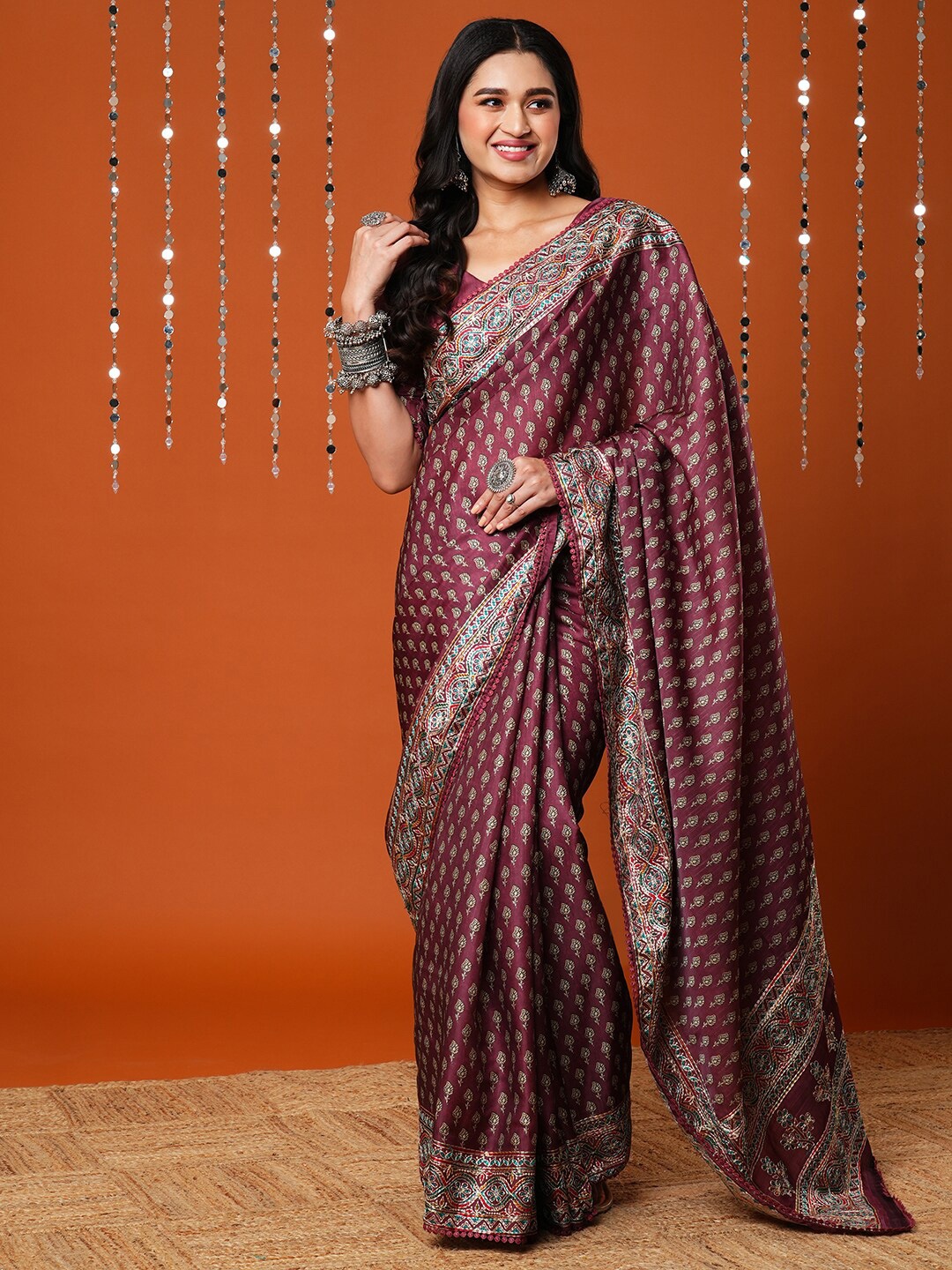 

Anouk Burgundy Ethnic Motifs Printed Embroidered Saree