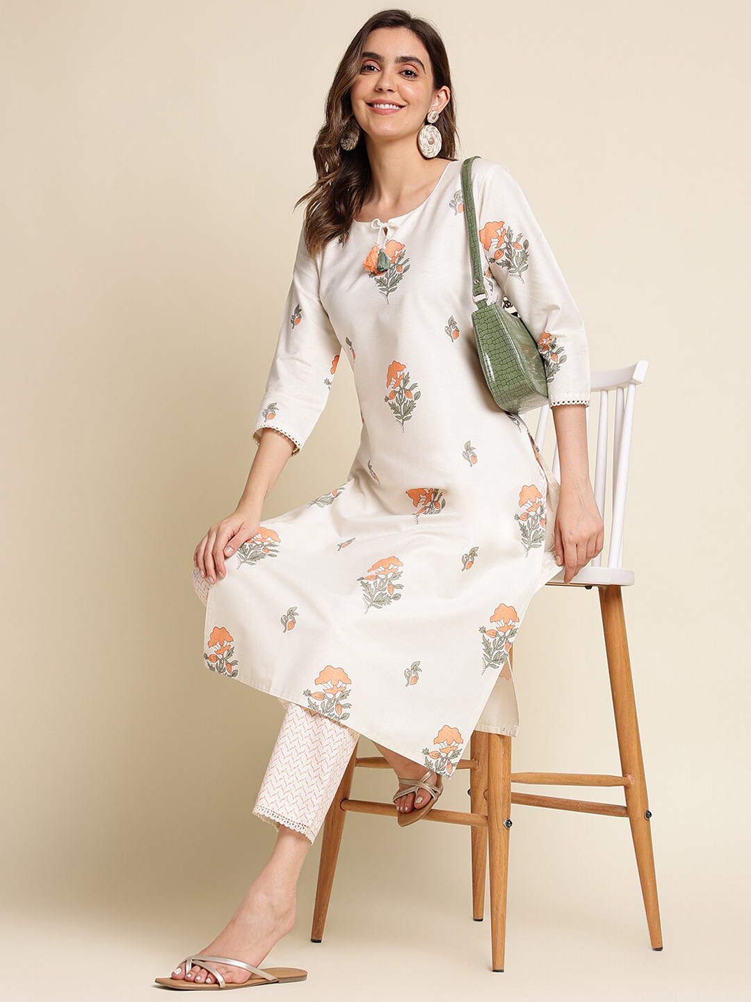 

Ishin White Floral Printed Regular Kurta with Trousers