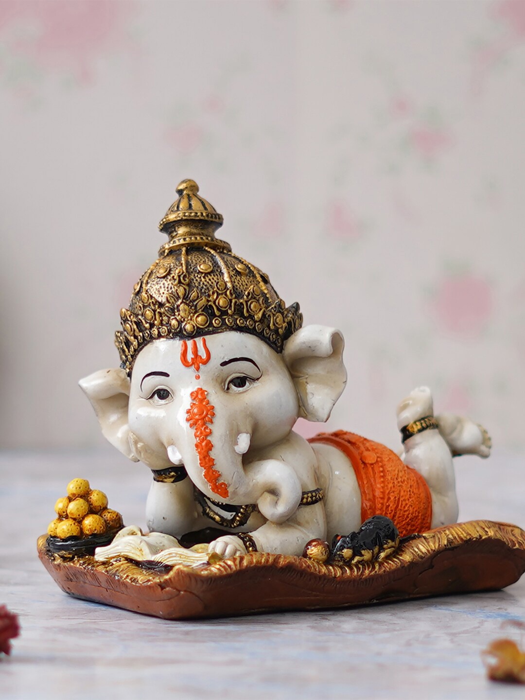 

eCraftIndia Orange Colored Resting Lord Ganesha Idol Decorative Showpiece