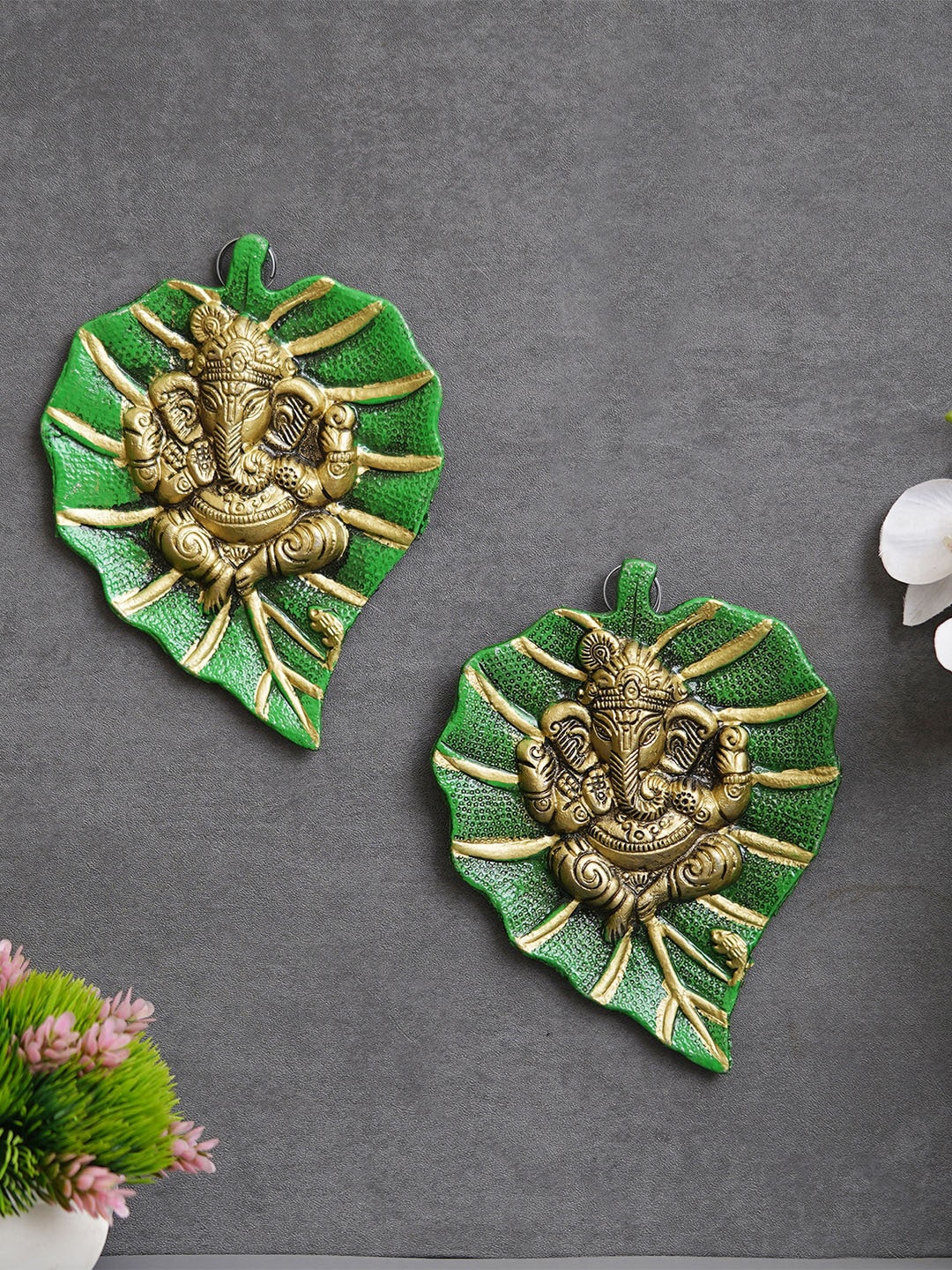 

eCraftIndia Green & Gold Toned 2 Pieces Lord Ganesha On Green Leaf Wall Showpieces