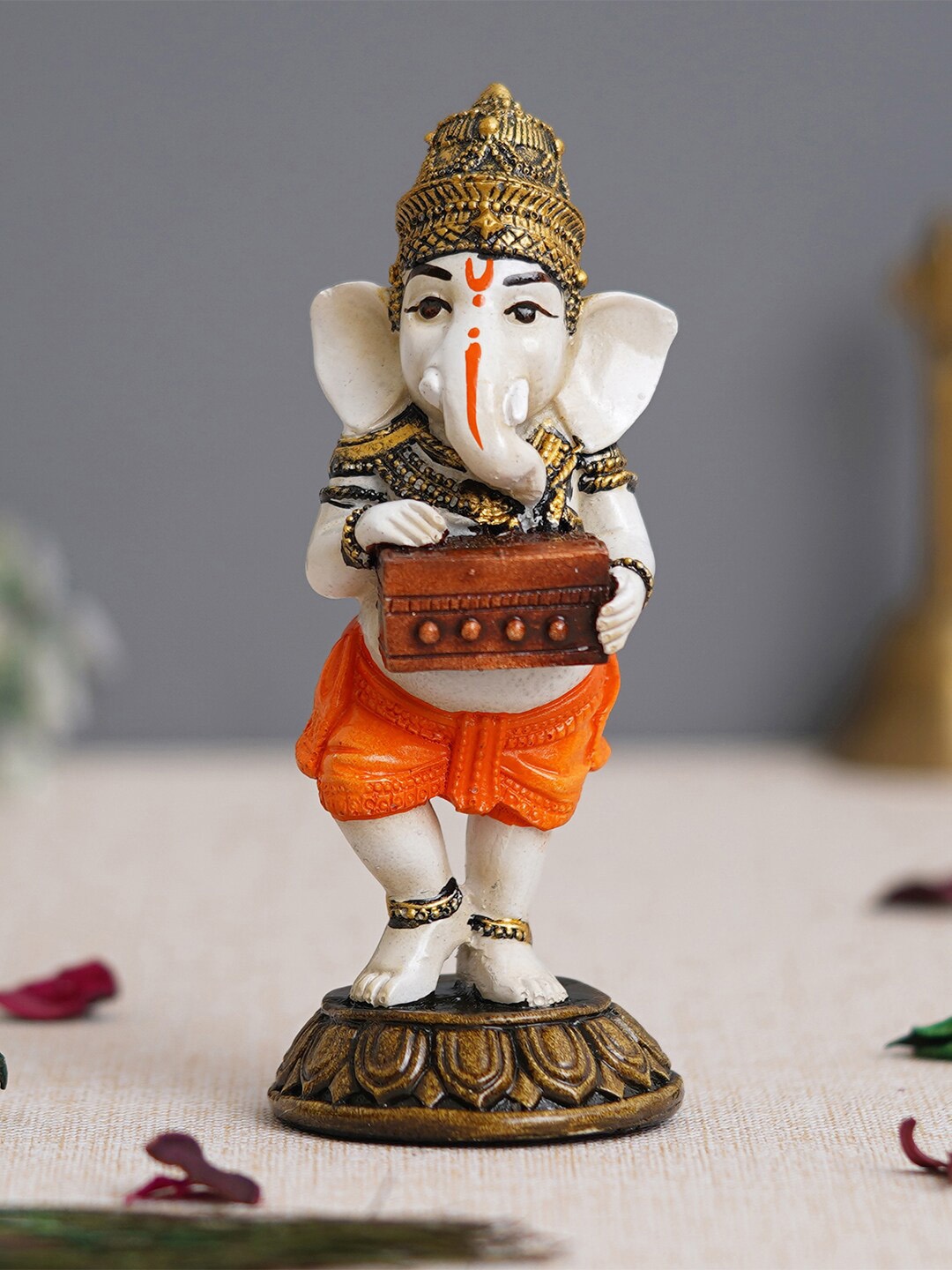 

eCraftIndia White & Orange Lord Ganesha Idol Showpieces