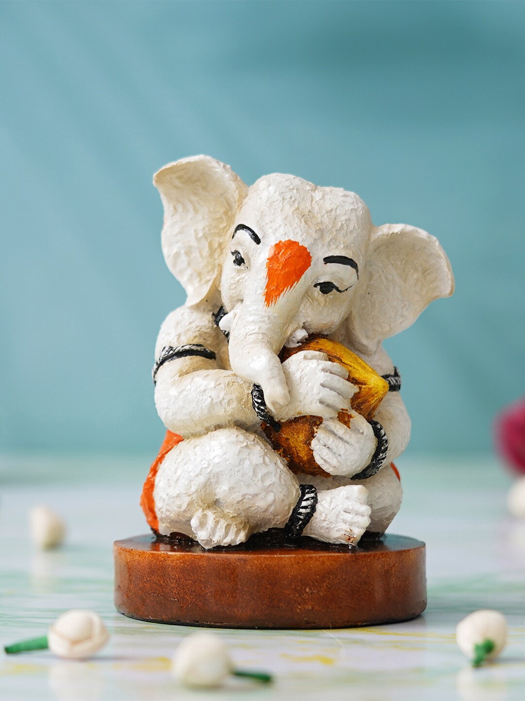 

eCraftIndia White & Orange Ganesha Idol Showpieces