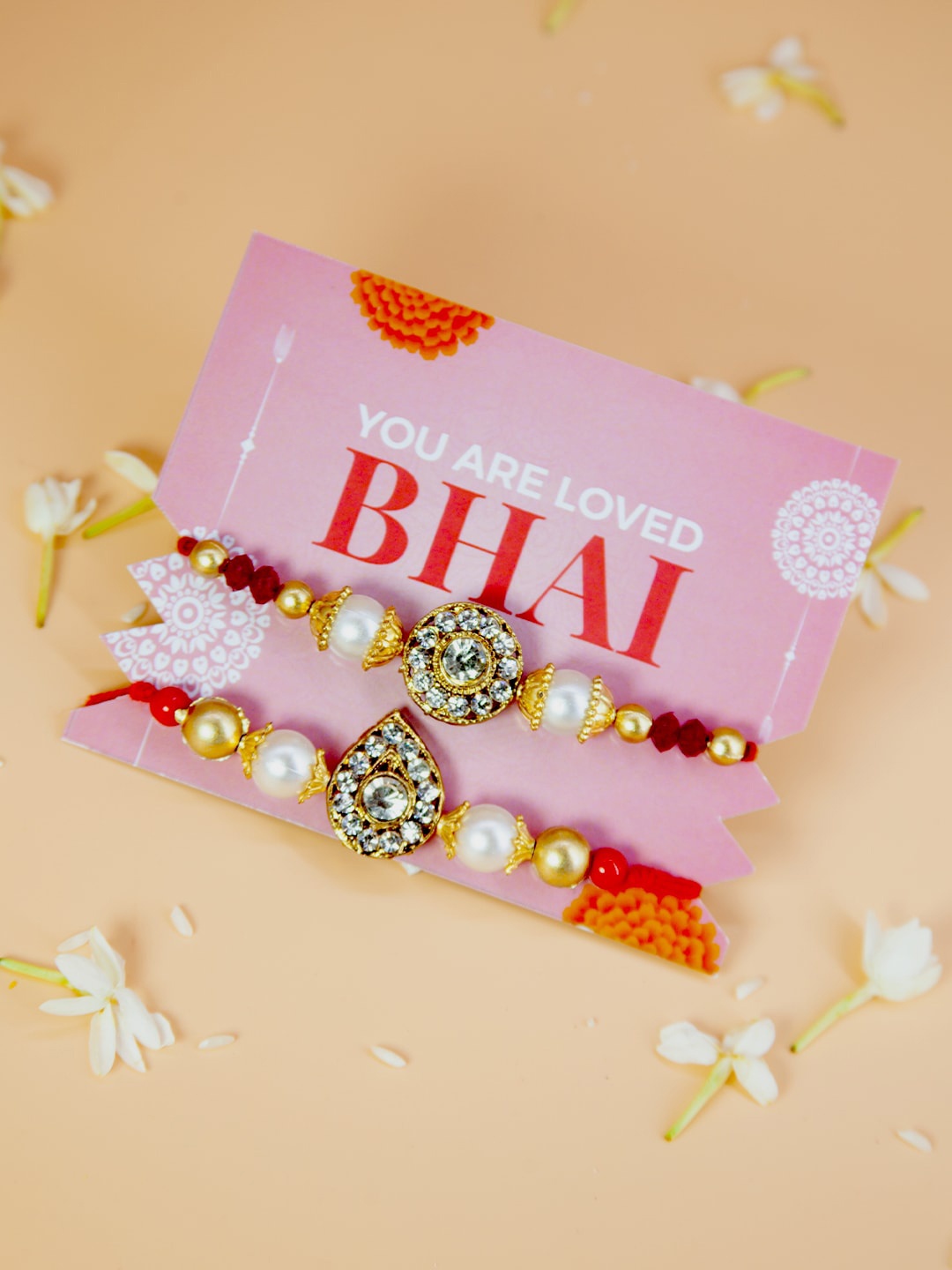 

Fida Set of 2 Handmade Pearl & Artificial Stone Studded Rakhis, Red
