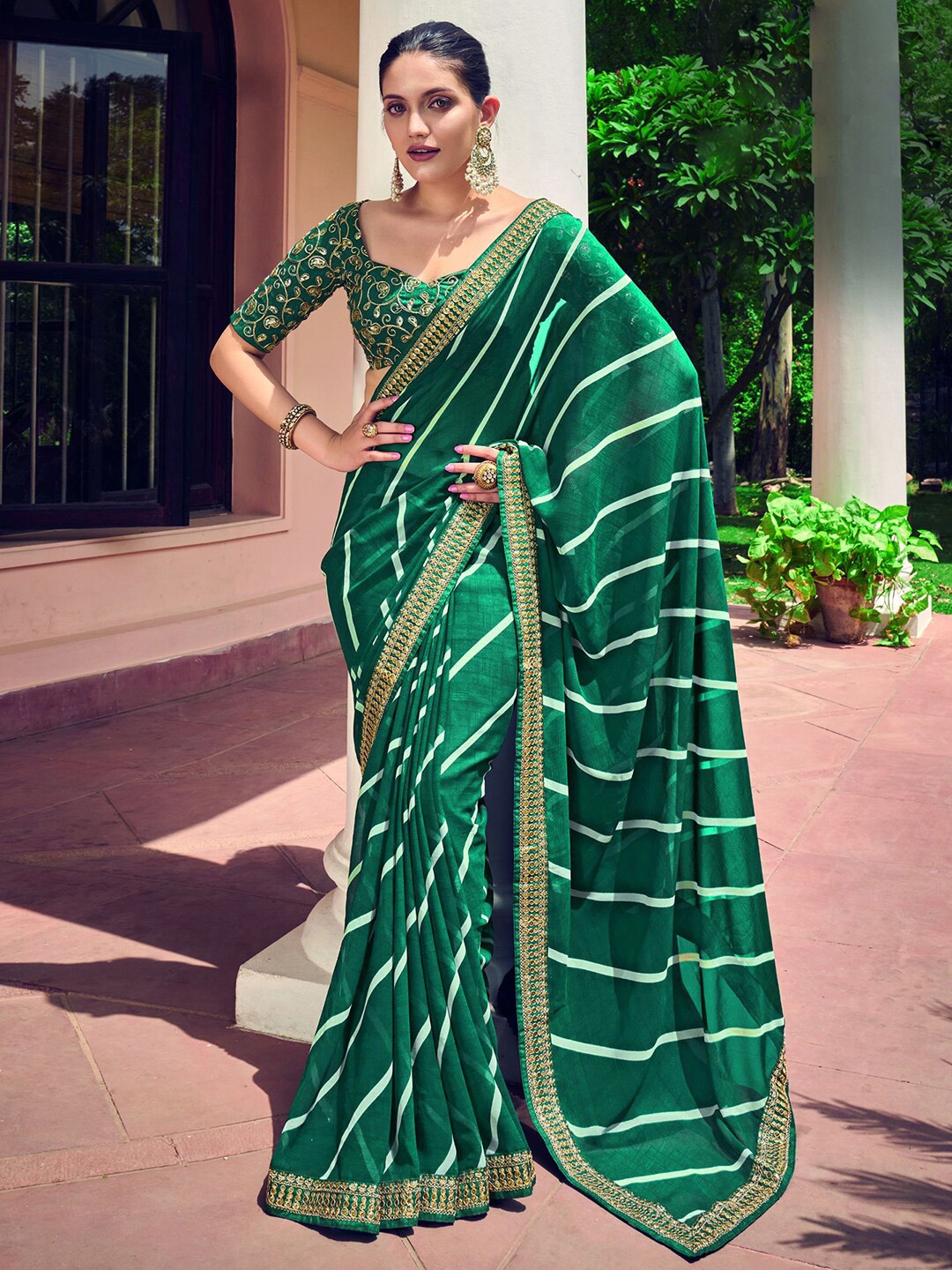 

Mitera Green & White Sequinned Poly Georgette Leheriya Saree
