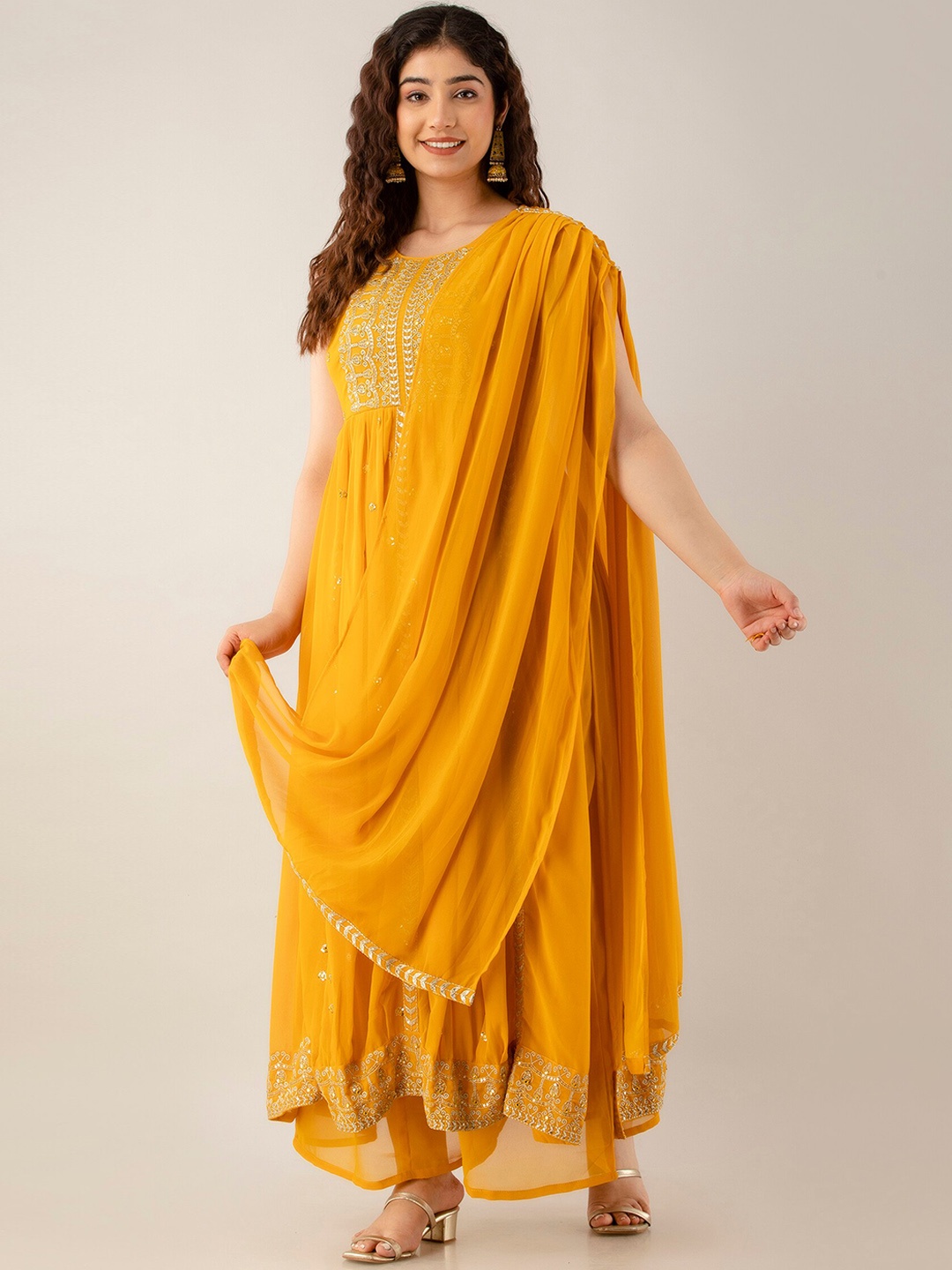 

Charu Embroidered Sequinned Mirroe Work Kurta With Palazzos & Dupatta, Mustard