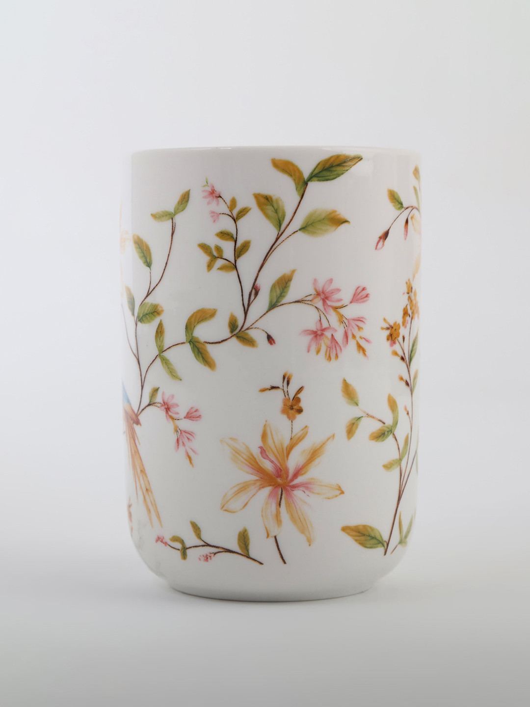 

Home Centre Nova-Dastkari White Ceramic Printed Tumbler - 330ml