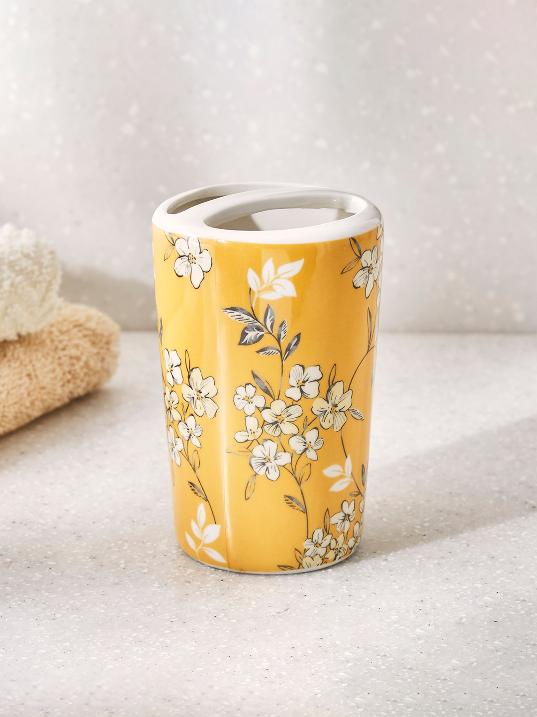 

Home Centre Yellow Mekong Ceramic Printed Toothbrush Holder
