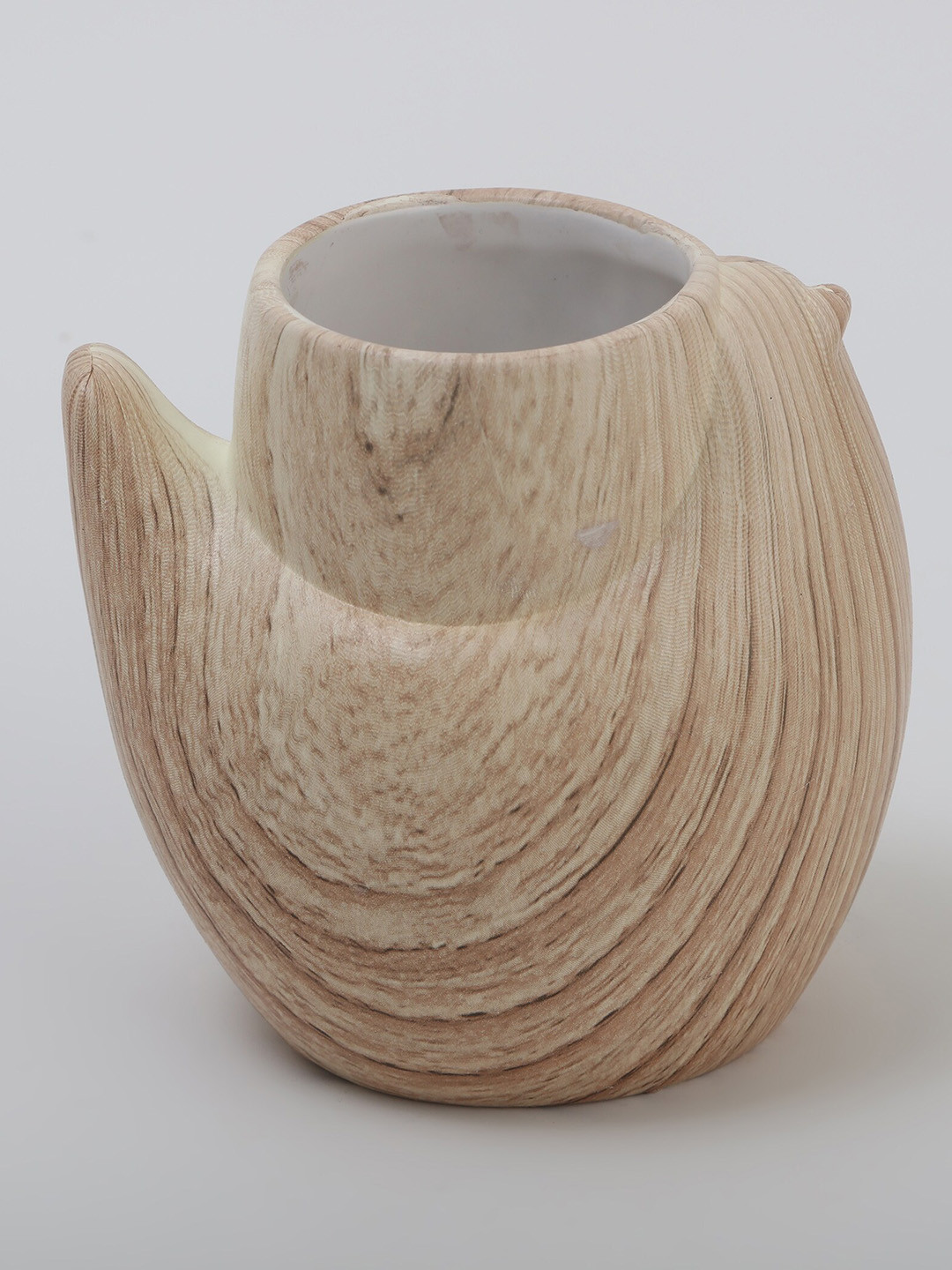 

Home Centre Nova Dastkari Beige Ceramic Tumbler